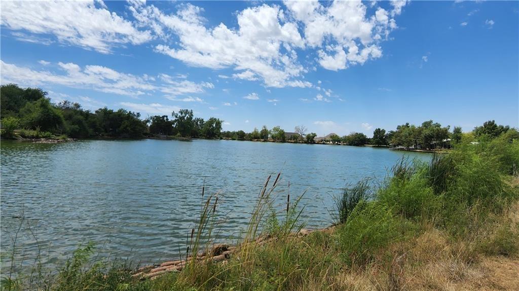 This is a fantastic location to build your dream home. 1.4 acres off of Western Ave. in the sought after Westmoore school district. Frontage to a small lake the view is incredible. It's in town South of SW 104th street. Gated community. This is the one.