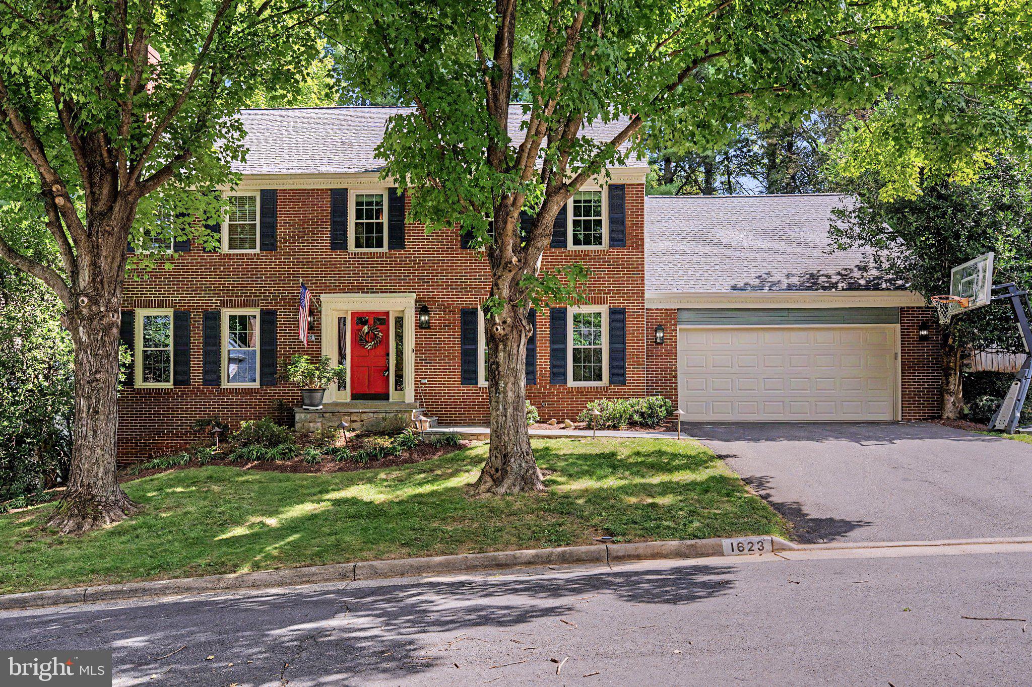 Tucked along a quiet cul-de-sac in one of McLean’s most convenient close-in locations and directly adjacent to Linway Terrace Park, 1623 Linway Park Drive offers the perfect combination of space, comfort, and everyday functionality while being just minutes from Washington, DC.  With 5 bedrooms, 3.5 bathrooms, two gas fireplaces, a two-car garage, and flexible spaces for work, gathering, and recreation, this classic residence with over 4000sf has been thoughtfully updated while preserving its warmth and character. Refinished hardwood floors extend throughout the main level, where crown molding, chair railing, bay windows, and French doors create a timeless backdrop. The living room is anchored by a gas fireplace while the adjoining dining room offers an inviting setting for entertaining.  At the heart of the home, the kitchen features white cabinetry, granite countertops, full-height tile backsplash, center island and pantry storage. A bright breakfast room overlooks the rear deck.  Just beyond and open to kitchen, the family room provides a comfortable gathering space with a second gas fireplace and French doors opening to the expansive deck. A private office with double French doors is a dedicated work-from-home space, while the mudroom includes laundry, new cabinetry, a utility sink, and access to the garage and deck. A freshly renovated powder room completes the main level. Upstairs, hardwood floors continue creating continuity and flow. The large primary suite with double-door entry, crown molding, a walk-in closet, and attic storage provides a quiet retreat and features a completely renovated luxury spa bath with dual vanities. Three additional bedrooms share a hall bath, while the fifth bedroom is en-suite with its own updated bath, ideal for guests or a second office. The finished lower level expands the home’s versatility with a spacious recreation room, built-in workspace, extensive storage, and updated LVP flooring. A dedicated media room makes movie night fun again, featuring fabric wall panels, dimmable sconces, built-in shelving, a projection screen, and integrated speakers. Outside, the deck overlooks the private backyard, creating an inviting setting for grilling, dining, and relaxed evenings at home. Improvements include bathroom updates, recently refinished main-level hardwood floors, replacement windows, an updated hot water heater, refreshed lower-level and laundry flooring, and a replaced front walk and stoop. The two-car garage includes cabinetry, a pegboard wall, and a workshop area.Linway Terrace Park is directly adjacent to the home and feels like your own park!  Enjoy a turf field, playground, tennis (pickleball) courts, and basketball courts.  Highlands Swim & Tennis Club, Chesterbrook Swim & Tennis Club, Pimmit Run trails, and Chesterbrook Shopping Center are all nearby. The Chain Bridge to NW DC, downtown McLean, Tysons, and the West Falls Church Metro are easily accessible.  Zoned for top rated Chesterbrook Elementary, Longfellow Middle, and McLean High School.