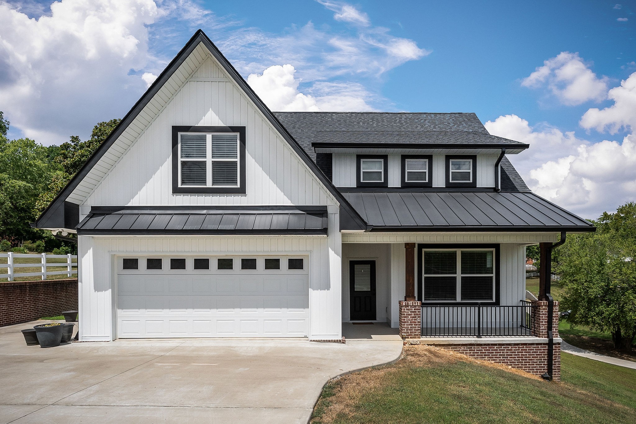Still like new, this one-owner home is loaded with quality features and sits in a great in-town location. Built on a slab for stair-free access, it offers a large two-car garage, a new storage building, and covered front and back porches. Inside, you’ll find oversized windows with custom blinds that bring in plenty of natural light, along with custom cabinets reaching to the ceiling, a pantry, and a gas stove, tankless gas water heater, and gas fireplace. The primary suite is on the main level and includes a tile shower, soaking tub, and a large closet. There’s also an in-home office with wainscoting that could double as a formal dining room. Upstairs, two large bonus rooms provide flexible space and could easily serve as a fourth bedroom. This home combines thoughtful design, comfort, and convenience in one beautiful package.