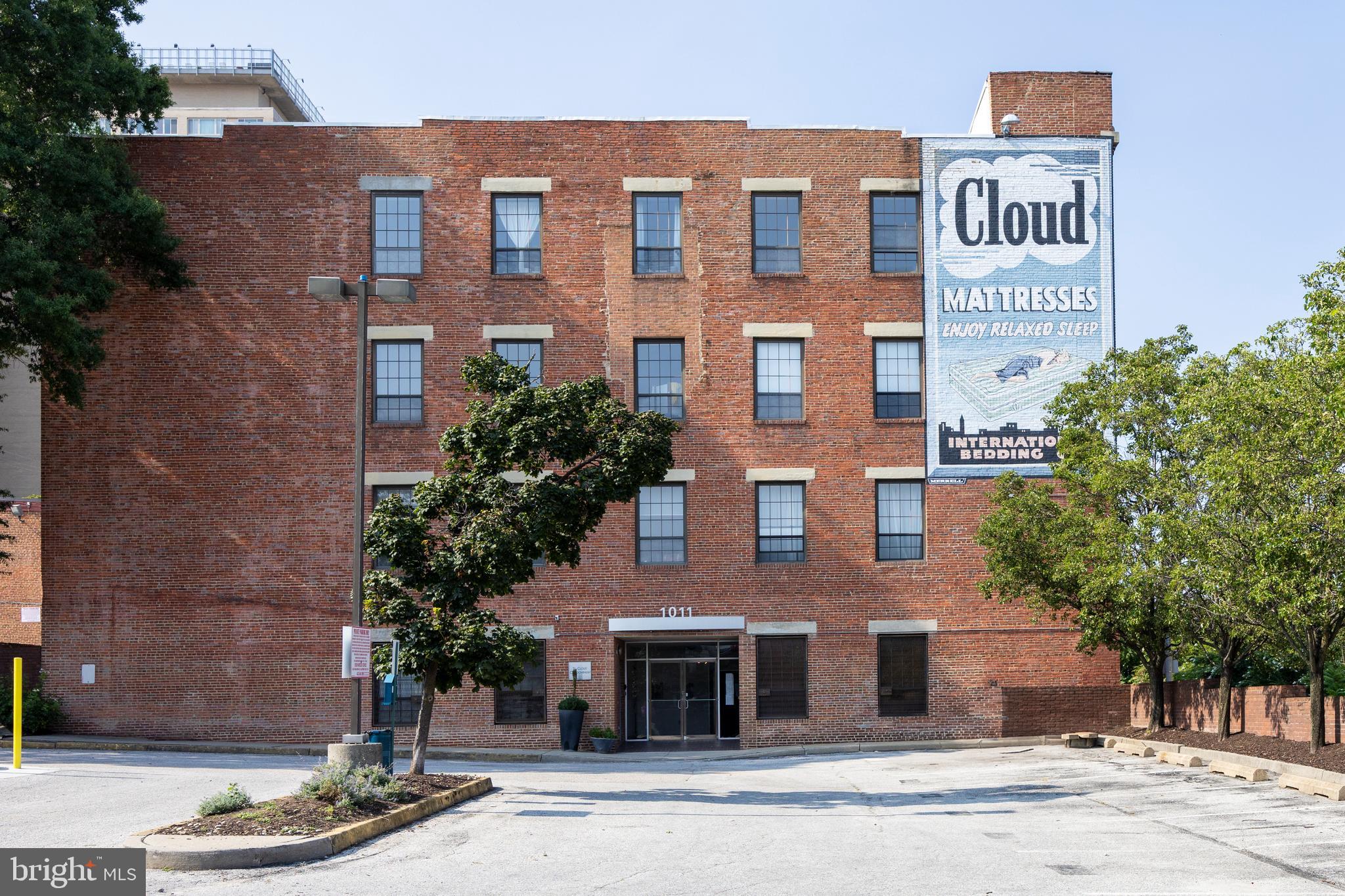 Price adjusted.  Steal this deal!.Perfect Midtown Location. Feels tucked away from all the hustle and bustle but EVERYTHING is at your fingertips.  Former factory reimagined as a totally unique open air atrium style building. Top floor location. 10 foot ceilings! Awesome light. Massive windows with fun city view. Love seeing the Belvedere Hotel|No need to drive around the block a few times hunting for that elusive parking space. The unit comes with a parking space! Score!. Nice kitchen with granite counters.  Come enjoy all that this vibrant area is famous for.*** Days on market reflect 45 days active/contingent status from past offer """