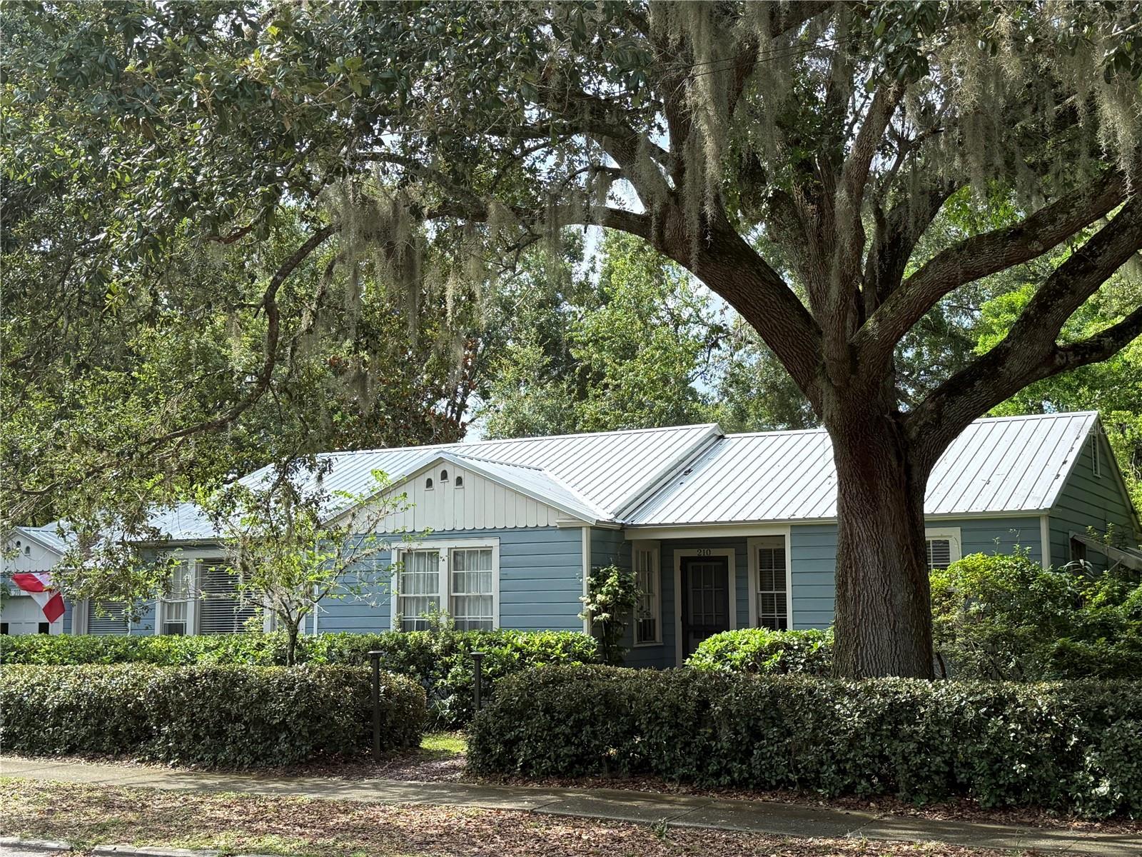 BEAUTIFUL HOME on a large corner lot in the Historic District of Mount Dora. This charming 4 bedroom, 2
bath home offer plenty of living options and features a metal roof- installed in 2023. Lush landscaping, a
fenced yard and a large patio, perfect for entertaining. 2 separate driveways provides plenty of parking
options. Approximately 1/2 mile to the Heart of Downtown Mount Dora!!