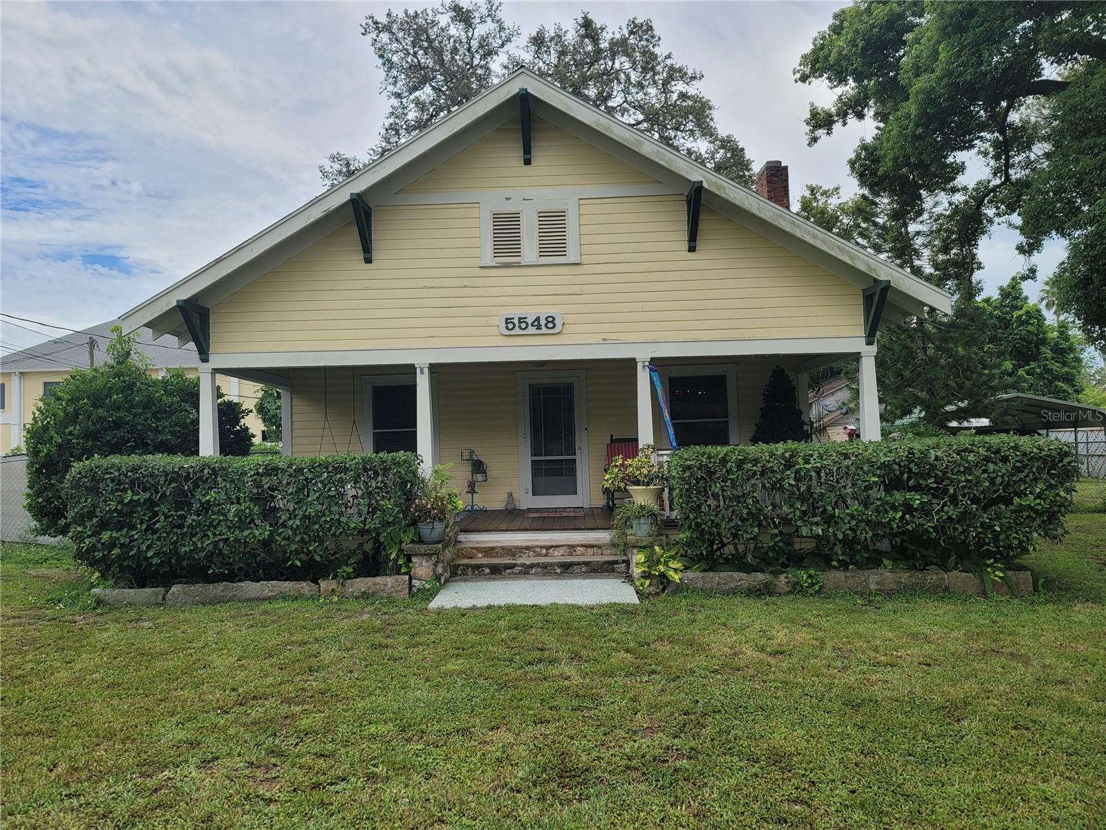 1925 Craftsman on a Half Acre MOL.  Effective Year Built 1961. Wood Floors, Metal Roof, Window Seat in Dining Rm, Freestanding Wood Fireplace, Claw Foot Tub. Storage 
Sheds,  Newer Above ground pool. Huge Frt Covered Patio 28 Ft X 09 Ft. Landscaped Huge Yard. Room For Rv/ Boat. Back Deck . Plenty of Room to Ad Large Garage Or Whatever You want  Great for Airbnb. Great Location in Historic Elfers No Flood Zone ( X )  High & Dry