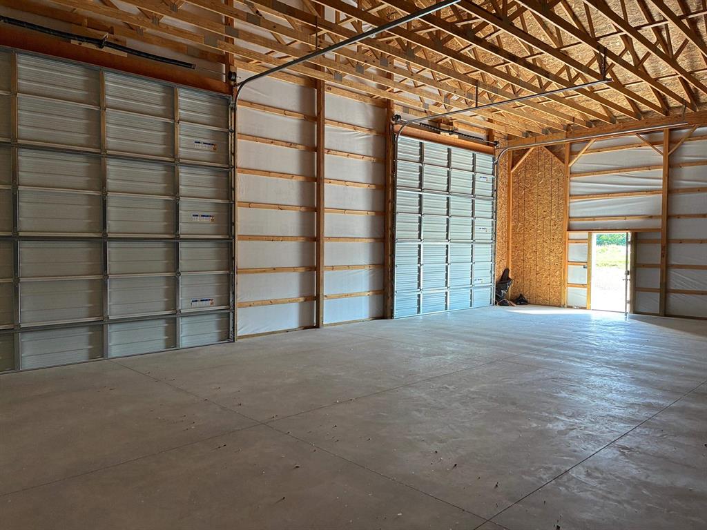 Incredible long-term business opportunity! One completed building, 4 units, with 34 additional buildings T.B.B., for a total of 190 units. These units will have sizes of 800 to 5000 sq.ft. Site condo development assuring reasonable restrictions are in in place for all. Asphalt roofs, 5" concrete floors, roll-up garage doors with separate entry doors to each unit. Development calls for bathroom T.B.B., water to each unit to be constructed. Perfect location 5 miles south of Cheboygan and a stone's throw from Burt & Mullett Lakes. Listing agent is related to one of the members