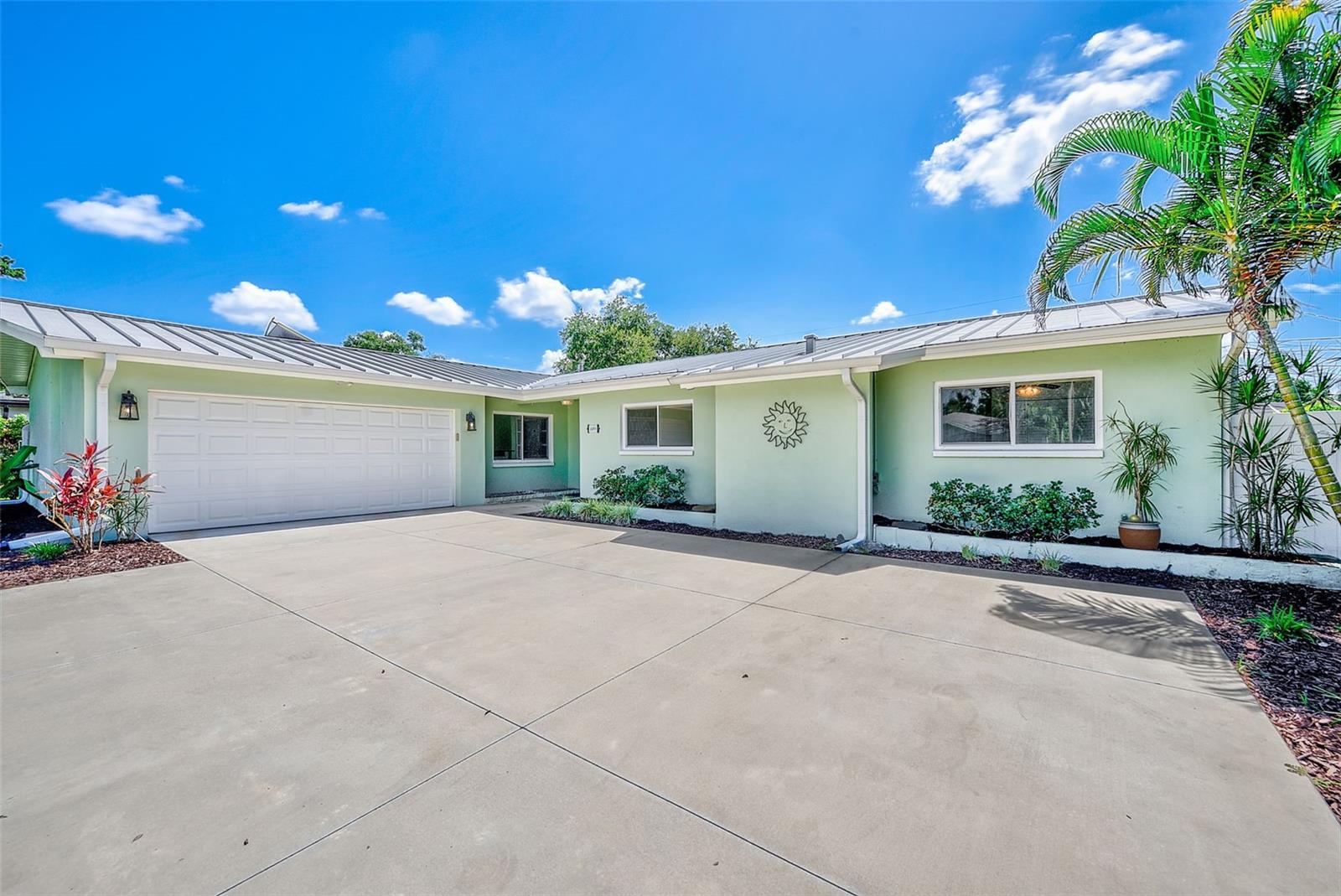 Welcome to this beautifully updated 3-bedroom, 2-bath pool home in the highly desirable Harbor Bluffs community of Largo! Offering the perfect combination of stylish updates, flexible living space, and exceptional outdoor living, this home is designed to make the most of the Florida lifestyle.Inside, you’ll find a spacious and inviting floor plan with beautiful finishes throughout. The kitchen offers generous counter space, ample cabinetry, and a convenient breakfast area, creating a comfortable gathering place for everything from morning coffee to casual meals and entertaining. The updated bathrooms and generously sized bedrooms add to the home’s move-in-ready appeal.A standout feature is the separate private bonus room located just off the lanai. Fully air-conditioned and tiled, this versatile space is not included in the bedroom count and offers endless possibilities. Use it as a private home office, workout room, study, hobby room, playroom, or peaceful retreat away from the main living areas.The outdoor living space is where this home truly shines. A large covered and screened lanai overlooks the beautifully landscaped backyard and heated pool and spa, creating a private oasis for relaxing, dining, entertaining, or enjoying a swim year-round. Mature landscaping and established trees provide a beautiful backdrop and enhance the sense of privacy throughout the property.Additional features include a metal roof, 2-car garage, and abundant storage, providing both convenience and functionality for everyday Florida living.Ideally located in Harbor Bluffs, this home offers a peaceful, established neighborhood setting while keeping you close to the Gulf beaches, Belleair, Largo, Indian Rocks Beach, shopping, dining, and countless recreational opportunities. Whether you’re looking for a full-time residence or simply a home where you can relax, entertain, and enjoy everything Florida has to offer, this property checks all the boxes. This is the Harbor Bluffs home you’ve been waiting for!