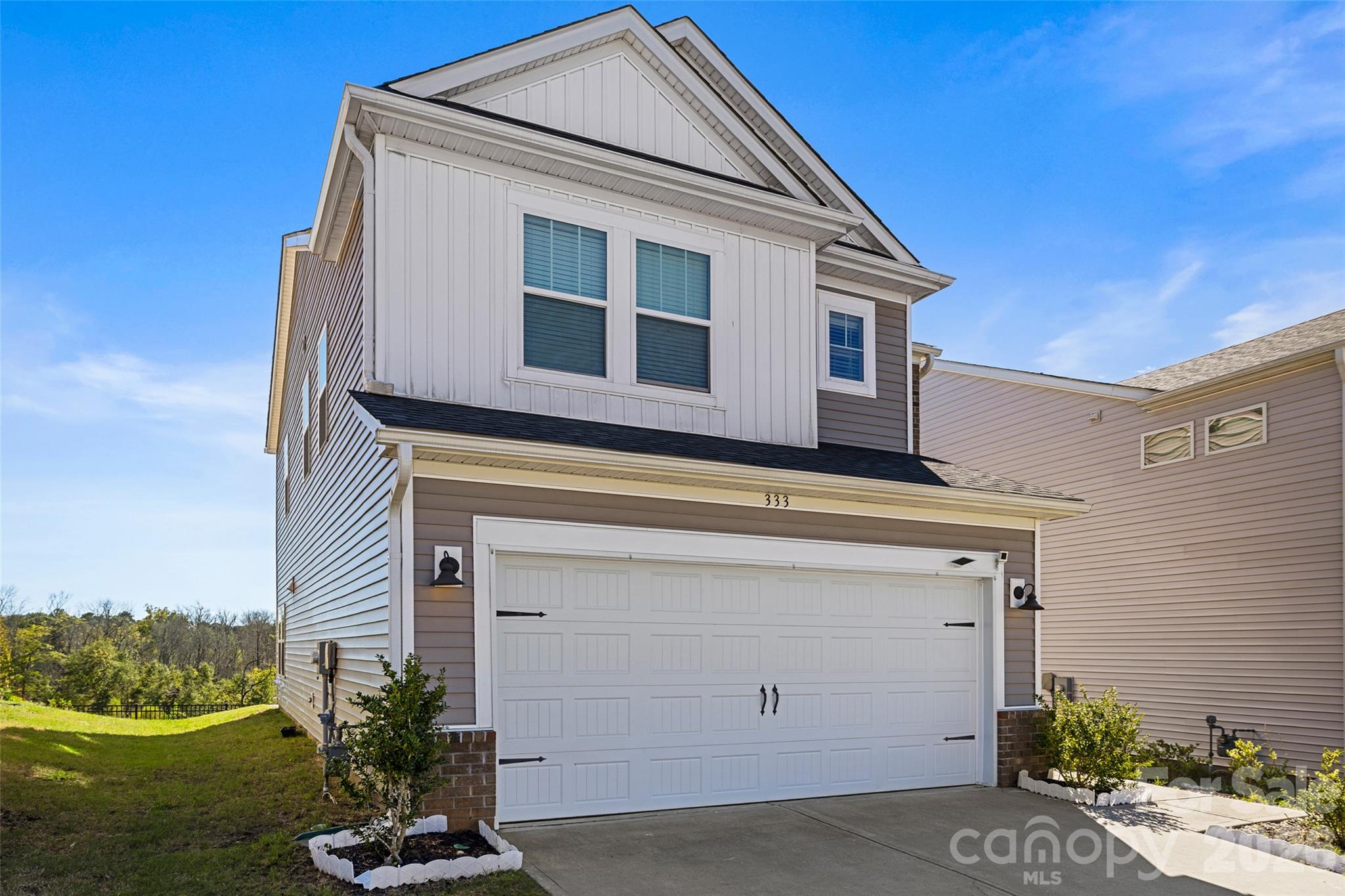 You do not want to miss 333 Hyssop! Built in 2022 and beautifully maintained, this move-in-ready home sits on a premium lot and offers the space, style, and flexibility to fit your life. The bright, open main level connects the kitchen, dining, and living areas, making it easy to host friends or enjoy a quiet night in.  The second story features a versatile loft and inviting bedrooms creating room to work, play, relax, and recharge.  The backyard features an upgraded extended patio perfect for weekend cookouts and evenings outdoors.  The garage has been meticulously upgraded with epoxy floors.  You can't beat the convenience of this location - minutes from I-77, Baxter Village, Kingsley, shopping, dining, parks, and top-rated schools!   Schedule your showing today!