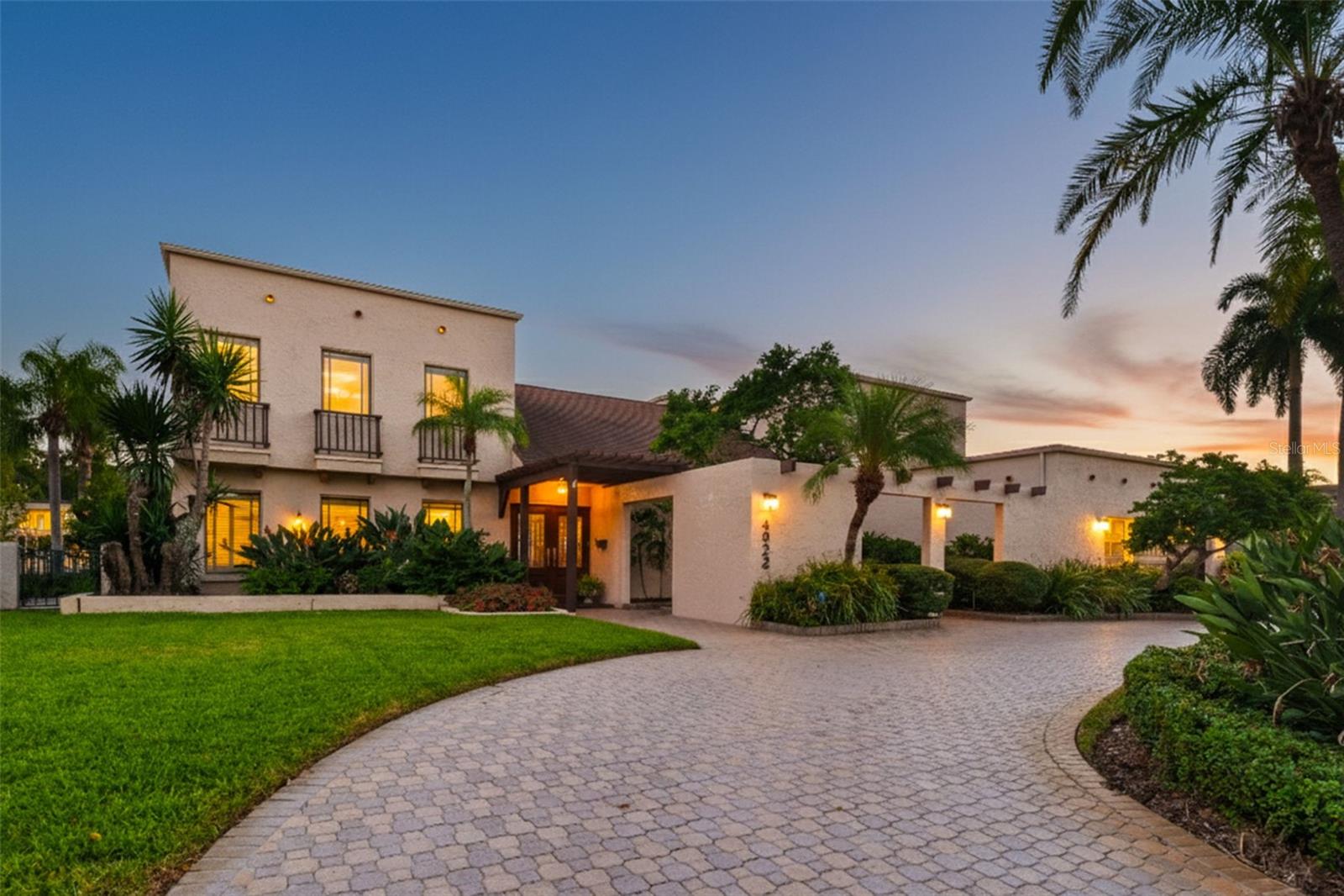Welcome to your waterfront oasis in the highly sought-after Beach Park Isles. Perfectly situated on an oversized 11,000+ square foot lot with 100 feet of pristine water frontage and just a couple of lots from the open bay, this custom-built residence offers the very best of Tampa Bay living. Spanning over 4,000 square feet, this two-story home features 5 spacious bedrooms, a two-car garage, and a thoughtfully designed floor plan ideal for both everyday living and effortless entertaining.Meticulously maintained by its original owner, the home showcases impact-rated windows and doors, an updated roof, newer HVAC systems, and an updated kitchen with high-end appliances, providing comfort, efficiency, and peace of mind. The property has never experienced water intrusion from storms, offering exceptional security and stability in a premier waterfront setting.Designed to embrace indoor-outdoor living, the expansive backyard is anchored by a large pool and private dock, creating a true waterfront retreat perfect for relaxing or entertaining while enjoying tranquil water views and breathtaking sunsets. Boating enthusiasts will appreciate the generous water frontage, deep-water access, and quick, easy access to Tampa Bay—ideal for kayaking, paddleboarding, or heading out for a day on the water.Located in an A-rated school district and just minutes from top-rated schools, Tampa International Airport, downtown Tampa, and the area’s finest dining and shopping, this home delivers both privacy and convenience. Whether you choose to personalize and elevate the existing residence or simply move in and enjoy, this is a rare opportunity to own a legacy property in one of South Tampa’s most desirable and established neighborhoods.