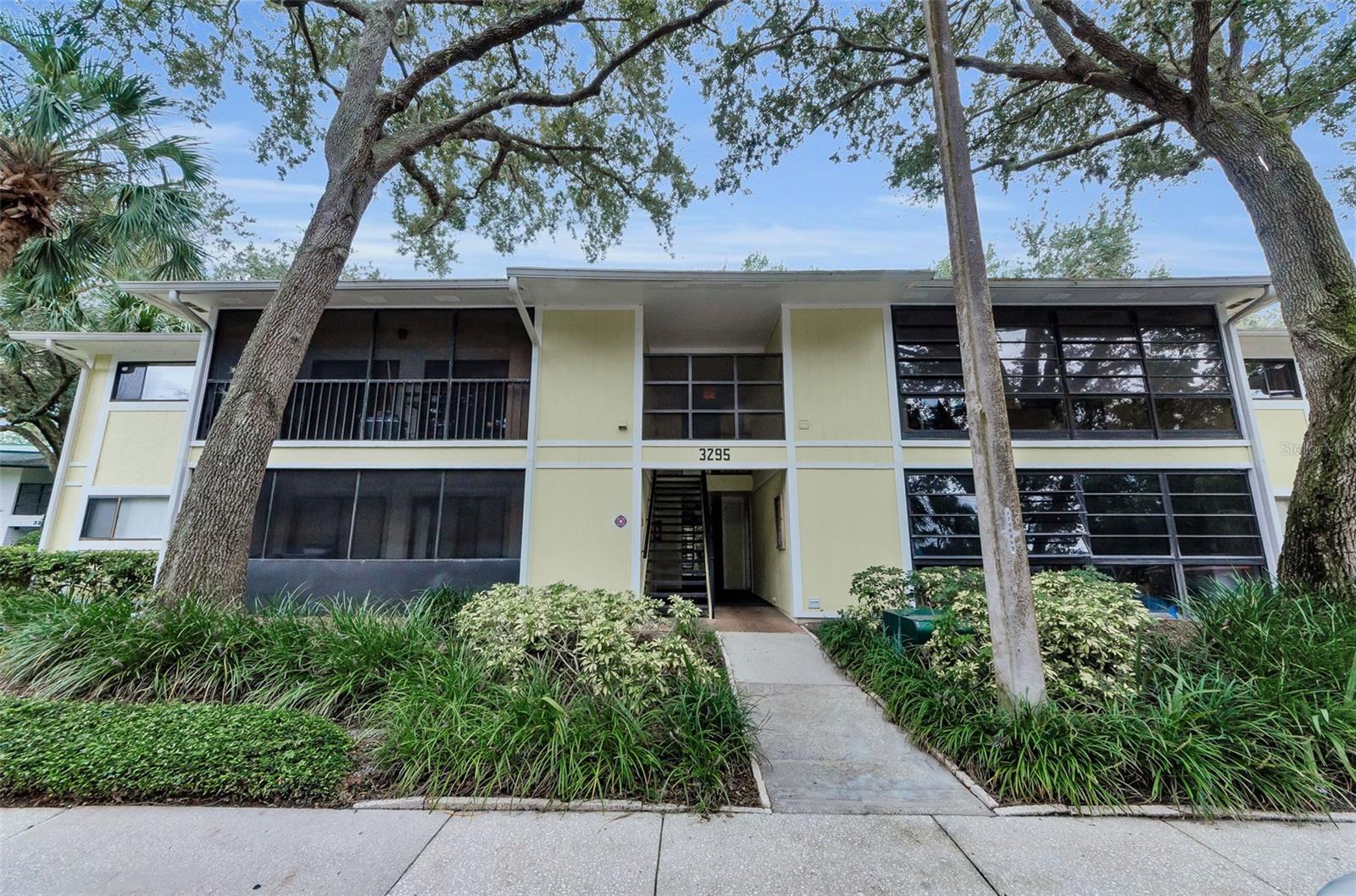 This awesome FIRST floor 2 Bedroom, 1 Bath condo is waiting for its new owner! This condo is conveniently tucked away near Innisbrook Golf Resort in this beautiful park like gated community. This unit offers an updated kitchen with solid surface countertops, stainless appliances and newer engineered hardwood floors throughout the home.  Additional features are 2 spacious bedrooms, beautiful hall bath, and a nice lanai to relax on enjoying your morning cup of coffee!  Light and Bright and awesome views of nature throughout the community! There is a laundry closet with a full-size washer and dryer so that you don't have to leave home to do your wash!  Sellers have a home warranty in place thru June 2026! Fox Chase is conveniently located in Palm Harbor with access from US 19 or Belcher Rd (Belcher Rd is for Residents only), with plentiful amenities that include a heated pool, clubhouse, tennis courts, fitness center, shuffleboard, park and playground. Just outside the community is shopping and dining, Honeymoon state park beach is 15 minutes away and the famous Tarpon Springs Sponge Docks is close by too! You won't be disappointed seeing this spacious condo, so schedule your showing today!