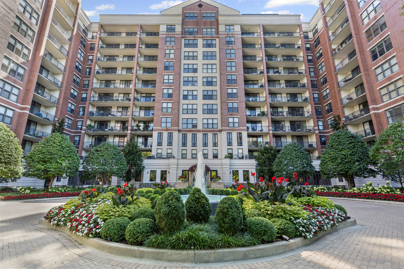 Welcome to the prestigious full amenity Park Newbury, a luxury condominium complex by the renowned Loewenberg & Associates overlooking Washington Square Park and the historic Newbury Library. The building exterior exudes opulence and grace with the center fountain and professionally landscaped gardens. Enter through the recently renovated lobby and be greeted by the professional, 5 star 24-hr door staff (truly the friendliest door staff in the city!) Head up the elevators to unit #608, one of the largest 2 bedroom floor plans in the building with skyline and treetop views for miles. An expansive chef's kitchen, appointed with warm honey-toned wood cabinetry and sleek granite countertops, opens seamlessly to the dining and family rooms-both accented with gleaming hardwood floors and extending out to a remarkable 18-foot balcony. Just off the kitchen, a versatile bonus room offers endless possibilities -  currently designed as a chef's prep area with additional custom cabinetry and ample counter space, it could easily serve as a third bedroom, private home office, or charming breakfast nook (in addition to the full dining room). The thoughtful split floor plan enhances privacy, ensuring no shared walls between the two bedrooms. The primary is adorned with two extra large walk in closets, a large set of windows overlooking the skyline, and a huge primary bathroom with separate shower and whirlpool tub and double sinks. The large second bedroom is also outfitted with a large, built out walk in closet and is positioned right next to the guest bath for convenience. Deeded prime parking spot #16 is included with the price. This well planned building has 5 elevator banks, a larger than life state of the art fitness center, a renovated party room, business center, two sundecks, a receiving room, and an onsite dry cleaners. Private MASSIVE 80 sq. ft. storage room with a steel door included in the price. The Park Newbury is dog friendly, has onsite management, and an onsite engineer. Walk to the Mag Mile, Oak Street Beach, and all of the shops and restaurants you could imagine. Please exclude the butcher block counter in the current breakfast nook.