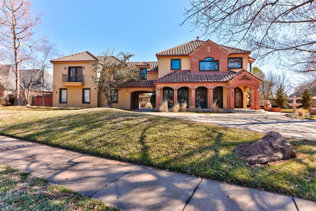 Nestled in the gated neighborhood of Fairview Farms, this stunning Mediterranean-style estate makes an unforgettable first impression. A grand, tall entryway welcomes you with a sweeping circular staircase, setting the tone for the home’s timeless architecture and thoughtful design. The entry flows seamlessly into formal living and dining rooms, where multiple sets of French doors open to the front porch. Designed for both everyday living and entertaining, the home features two stairways for added convenience and functionality. Situated on an oversized corner cul-de-sac lot, the backyard is a true private retreat, complete with a striking black-bottom pool and spa, outdoor fire pit, and built-in grill. Additional highlights include a circular driveway, gated rear parking, and exceptional curb appeal in one of the area’s most desirable neighborhoods. This is a rare opportunity to own a truly elegant home that blends classic Mediterranean charm with resort-style living.