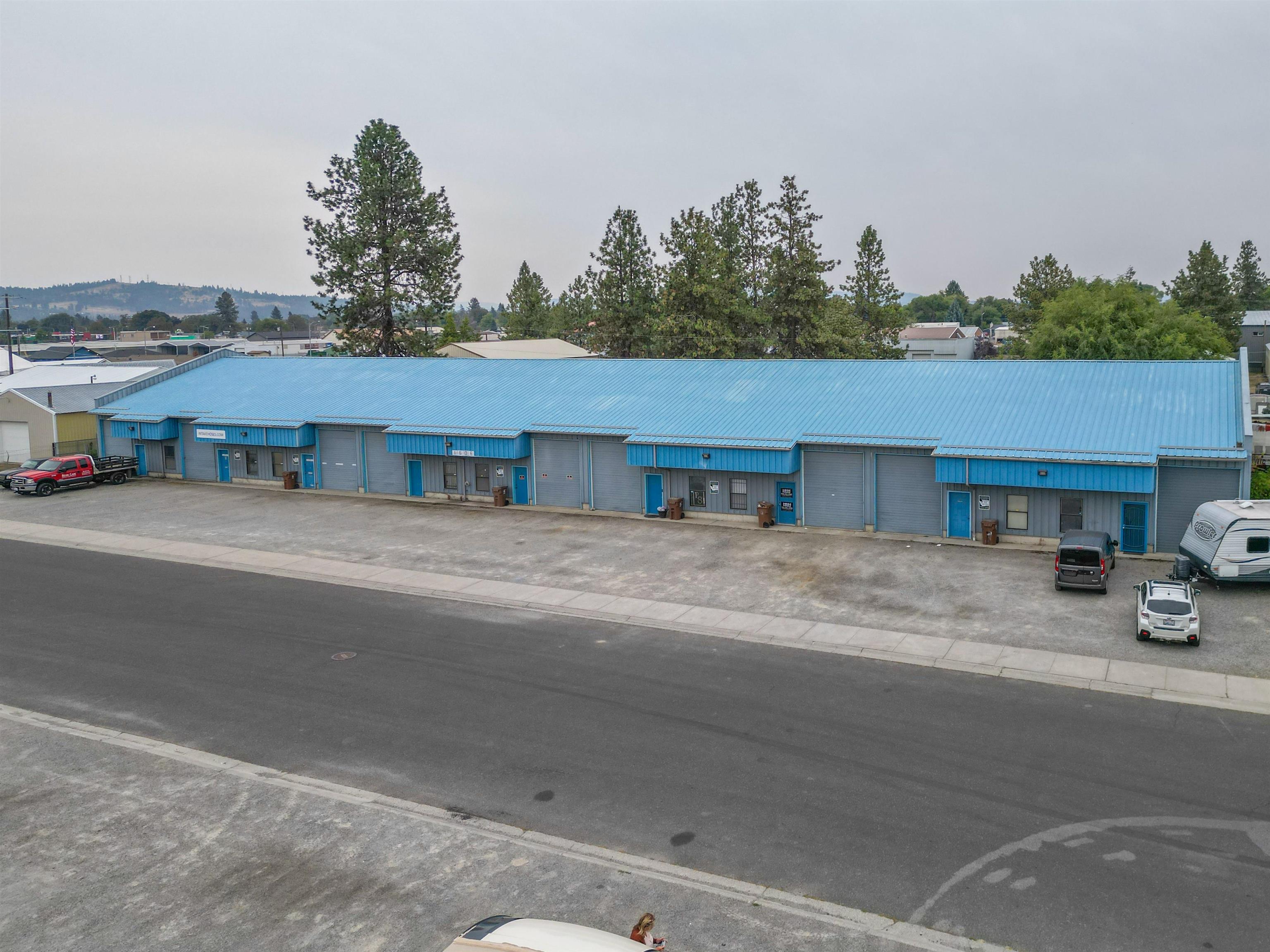 9-unit warehouse building.   Fully occupied.  Long term tenants.  All separately metered gas & electric.   Each unit is a 1,500 sqft. bay with a 12' overhead door in front and drive through with another overhead door in the back.  13.5' ceiling height.   Each unit is completely open and have a small office, bathroom, gas heat, and In the back is a fenced 40' x 25' yard.  Gross annual rents $96,040.