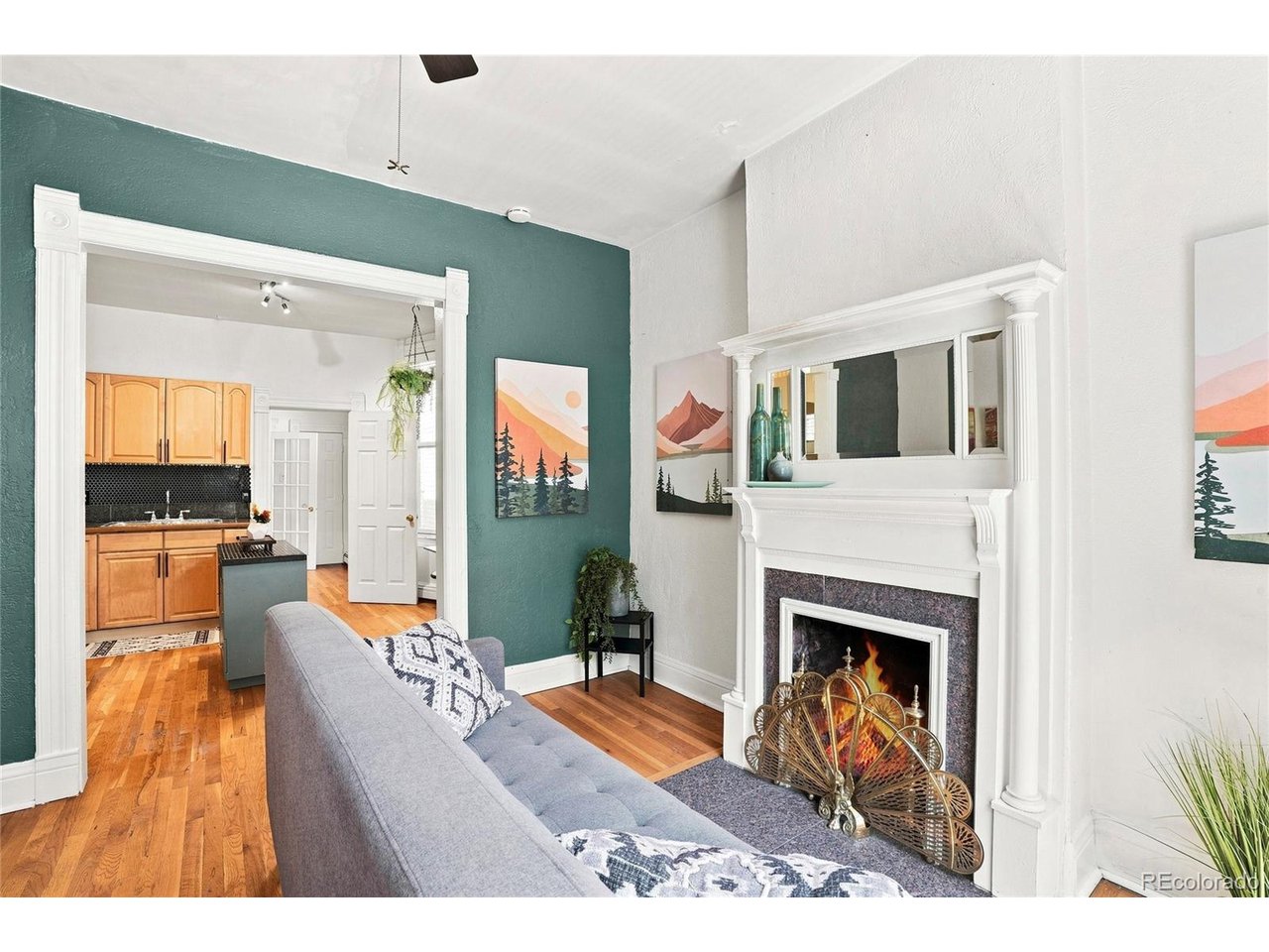 It's a crisp Denver morning, the kind where the light hits just right and you think, "Could this be... the one?" You round the corner into North Capitol Hill and there it is, a 2 bedroom, 1 bathroom bungalow with the kind of charm that makes you drop your coffee in slow motion. This isn't a look once-cute. This is a move-in cute. Inside, sunlight pours through the windows like it's auditioning for a supporting role. Two cozy bedrooms wait for your best friend sleepovers, your home office dreams, or just a really nice reading nook situation. The bathroom? Classic, timeless, ready for its close-up. But here's the third-act twist: location, location, location. Step outside and Cap Hill unfolds like the best kind of romantic subplot: coffee shops, patios, and parks all within an easy, meet-me-halfway walk. Got a thing for live music? The Ogden and The Fillmore are basically your new neighbors, and Mission Ballroom is just an Uber away (no grand gesture required, just tap dat app). Every scroll through your camera roll is about to look like a movie poster. Golden hour on the porch. Skyline views on your walk. This is the montage, and you're the main character. No sequel needed, this is happily ever after, floor plan included.Schedule your showing before someone else writes their own love story here first.