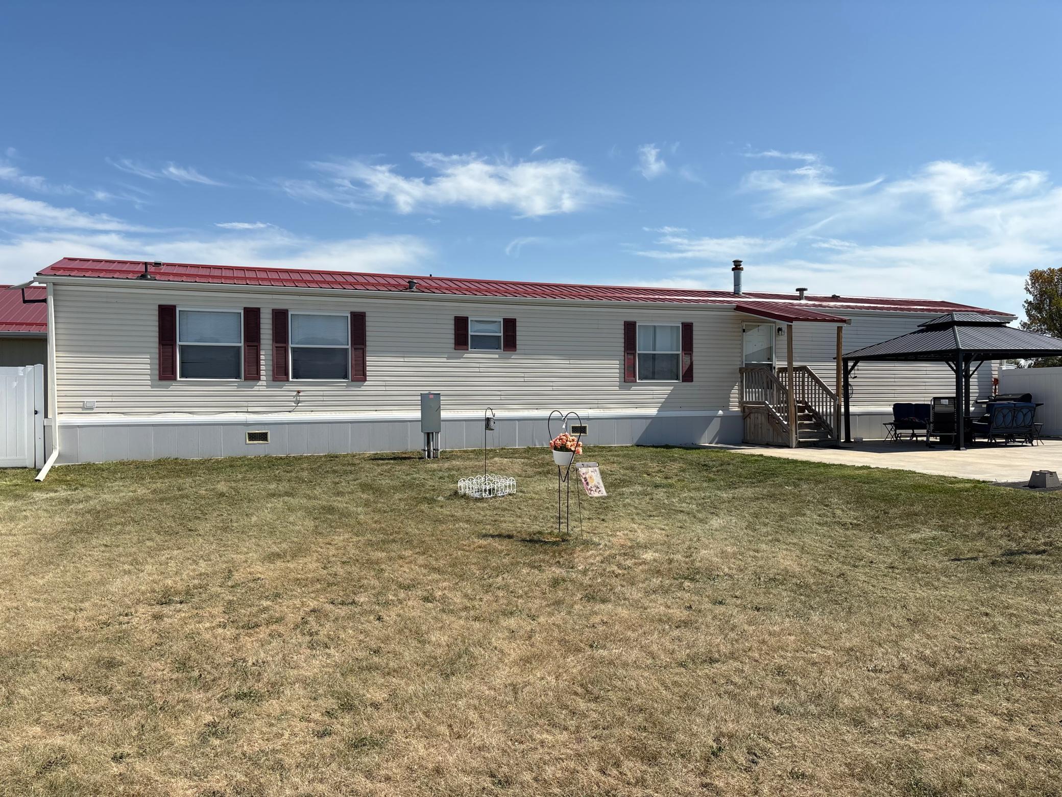 Motivated Seller!!  Price Improvement!! This is a great property just a few miles from Long Prairie,  Very well maintained home with 3 bedrooms and 2 full baths.  The home has  many updates new furnace and hot Water heater in 2019 new hardwood in 2017  and new Roof in 2021 . There is a newer 2 car attached garage, the yard is completely fenced with the boundary of the property being  also fenced.The Home is attached to the property with 26 cement piers.  In the back yard you will find a cement patio with an attached gazebo.The property has a chicken coop that will stay, Seller has planted a lot of trees on this property also you will find raspberry and blue berries and some apple trees, there is also a large fenced in area for a garden!!