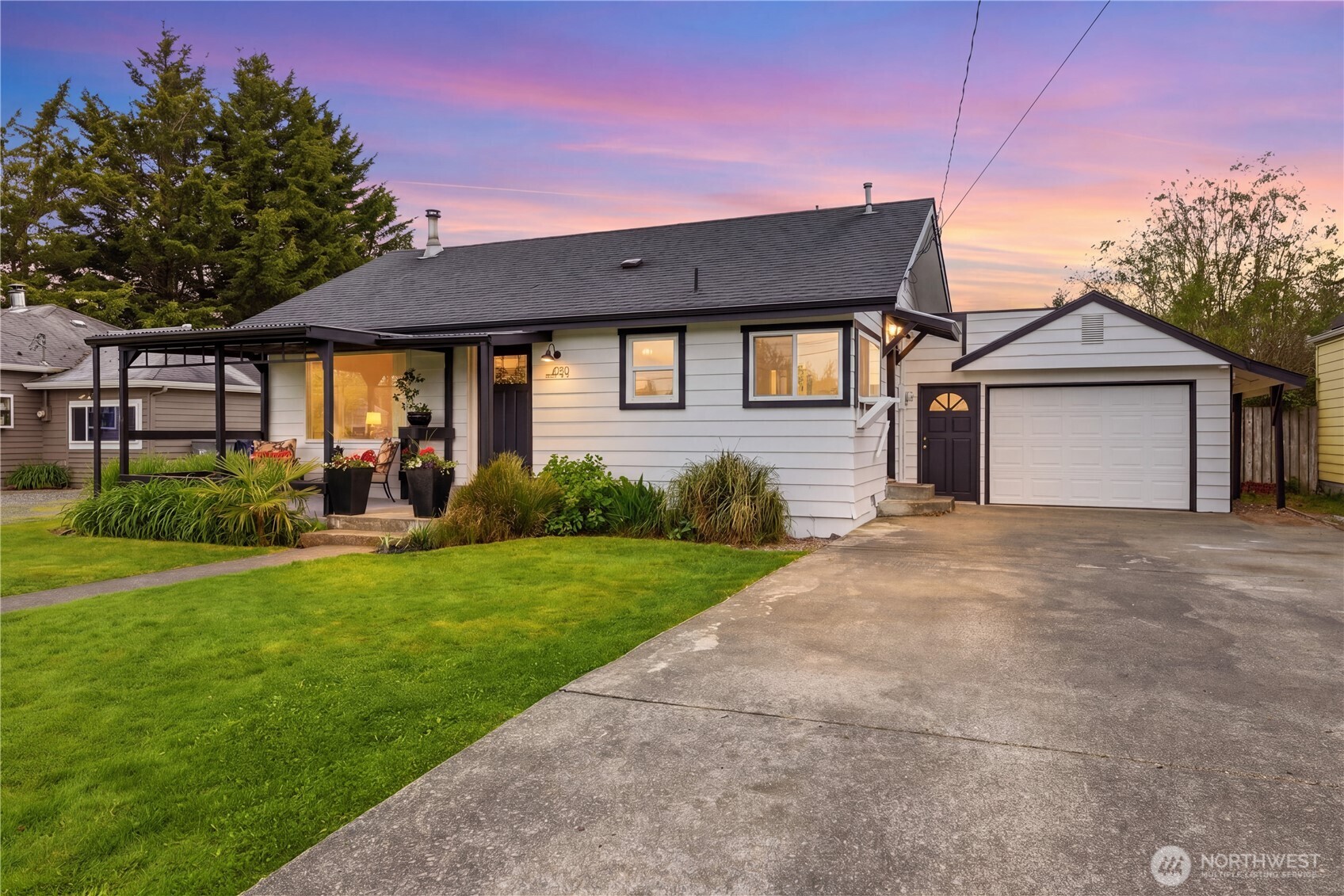 Nestled in the charming town of Enumclaw this beautiful craftsman home has the walkability to town in minutes. All new freshly painted exterior, this thoughtfully designed floor plan features 3 bedrms 2 bathrms, spacious living area w/cozy wood stove and kitchen with dining space. Home has original hardwood floors in living rm, 2 bedrms and remaining floors have engineered hardwood and no carpet. Kitchen has been completely updated w/new cabinets, granite counters, stainless steel appliances, lighting and engineered hardwood floors. Spacious primary is located in the back of the home w/its own private bathrm that has beeen freshly updated. Secondary bathrm was completely updated as well. Home has all new lighting, ceiling fan, 6" base moulding, trim moulding & wood wrapped moulding on windows, fresh interior paint, new interior doors w/new hardware, newer front door & new sump pump. Step outside your front door and enjoy the covered entry and front deck that is captivated by the view of the foothills, all the gorgeous flowers and mature low maintenance landscape. Head out back to your nice size fully fenced backyard to a freshly painted 12x10 storage shed, open covered storage area/entertaining space and enjoy additional oversized covered back patio w/new ceiling fan. Your one car garage has a new roof and driveway that can park up to 4 cars. Home feels and lives larger than it is. Close to schools, restaurants, shopping and medical.