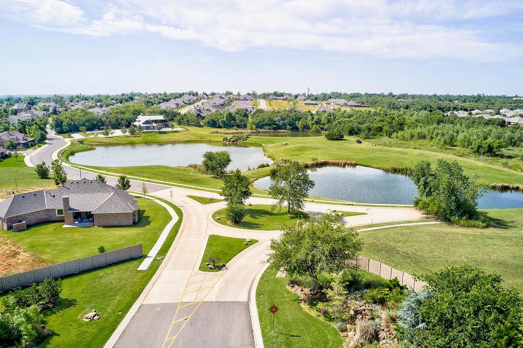 This is just one of several different types of lots ranging from $60,000 to $125,000. This particular lot is a really good size and in a cul-de-sac. The neighborhood offers a variety of different lot sizes, prices, and desirable views. All homeowners will benefit from the abundance of amenities this well thought out subdivision has to offer. The clubhouse is simply spectacular with none other like it in Norman. This clubhouse is available to residents for private parties as well as daily use when not reserved. The pool is an official lap size pool which allows plenty of space for all. Enjoy fishing in the private lake, walking trails, and expansive greenbelts. Hallbrooke offers several outstanding builders to choose from. Imagine coming home to Hallbrooke. Welcome Home!