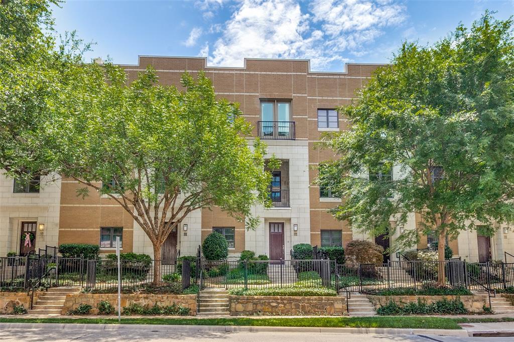 Sophisticated three-story townhome with private rooftop deck and gated front yard in The Vine, a sought-after Uptown Dallas community with a resort-style pool. Ideally positioned just moments from the Katy Trail, West Village, Knox Street, and McKinney Avenue, this residence offers the ultimate walkable urban lifestyle with premier dining, shopping, and entertainment right outside your door.Designed for both everyday living and entertaining, the open-concept main level showcases 11-foot ceilings, hardwood and travertine flooring, a home audio system, granite countertops, stainless steel appliances, wine refrigerator, and abundant natural light throughout. The spacious first-floor bedroom features an ensuite bath and upgraded custom closet system, making it ideal for guests, roommates, or a private home office.The third floor is dedicated to the luxurious primary retreat, complete with a Juliet balcony, oversized spa-inspired bath, expansive walk-in closet, utility room, and a dedicated study or flex space perfect for working from home.The private rooftop deck offers an exceptional extension of the living space, complete with Trex decking, turf, and a pergola—ideal for entertaining, outdoor dining, morning coffee, or unwinding after a long day.Enjoy a true lock-and-leave lifestyle with convenient access to Downtown Dallas, the American Airlines Center, Katy Trail, West Village, Knox Street, and some of the city's most popular restaurants, boutiques, and entertainment destinations.