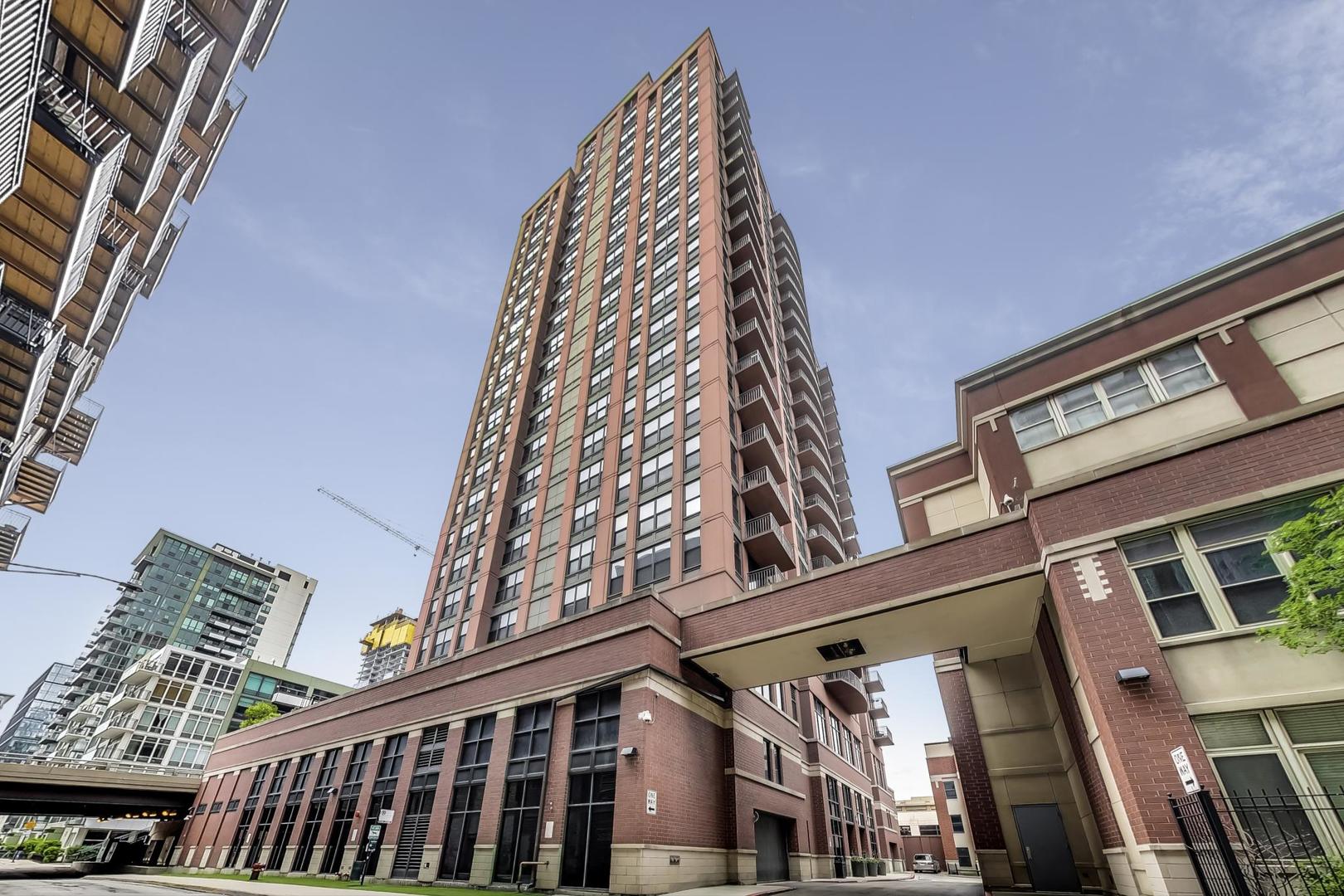 Welcome to this gorgeous updated corner unit at Kinzie Station! Bright and airy energy welcomes you into the wide-open main area with sweeping skyline and river views. Clean modern aesthetics provide timeless style and a perfect canvas to make it home! The vast island, with built in wine fridge, and natural layout of the room make this a tremendous place to entertain all your friends and family. All of this spills out onto a great balcony where to take in the stunning views of the Chicago Skyline. The primary bedroom is easily large enough to accommodate a king-sized bed and a large dresser or desk for WFH. The eastern exposure is sure to get your day going on the right note with all of the morning sun, a standard closet, and a huge walk-in closet with custom built-ins! Crisp, clean lines in the bathrooms that will look great for years to come. The large soaker tub provides the perfect way to unwind at the end of a long day, too. Ideally situated on the opposite side of the condo, the second bedroom offers enough space to use as both a guest room and office at the same time. With ideal views up the north branch of the Chicago River, you get great sunlight without baking in the southern sun, too. Complete with in-unit washer and dryer, smart thermostats, a separate storage locker, and attached heated parking, this unit is the perfect place to call home. The building offers an array of amenities, including a 24-hour door staff ensuring security and convenience, a fully-equipped fitness center, and a landscaped terrace perfect for relaxation. Additional conveniences such as an on-site dry cleaner, party room, Amazon Hub, and a pet-friendly environment with a dedicated dog run cater to diverse lifestyles. Nestled in Chicago's vibrant Fulton Market River District, this prime location offers residents unparalleled access to the dynamic West Loop and Fulton Market neighborhoods, renowned for their award-winning restaurants, lively nightlife, and cultural attractions. The neighborhood boasts excellent walkability, with grocery stores like Jewel-Osco located just across the street, and Mariano's and Whole Foods nearby. Fitness enthusiasts will appreciate proximity to the East Bank Club, while commuters benefit from easy access to Metra stations, CTA Green, Pink, and Blue lines, and major expressways. Parking is an additional $30k.