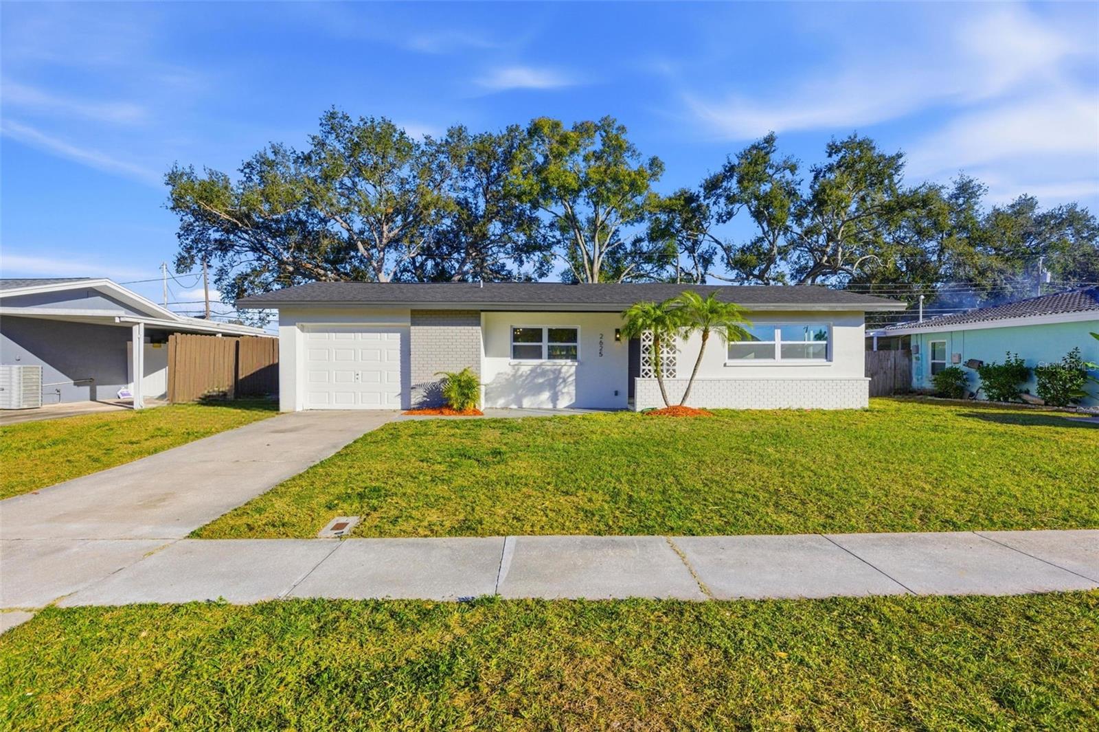 FULLY RENOVATED with higher end upgrades! NEW NEW NEW! This 2 bedroom, 1.5 bath property features a deep one car garage, a fully fenced large backyard, and upgrades from top to bottom. NEW roof, NEW HVAC, NEW windows, and a NEW electrical panel. The interior showcases brand new luxury vinyl flooring throughout and a bright open floor plan that feels spacious and airy.  The kitchen is the centerpiece of the home. It has been completely redesigned with a true chef layout, a large island ideal for entertaining, modern finishes, and excellent flow into the living and dining areas. Bathrooms are fully updated with designer finishes and clean modern style. The backyard offers plenty of space for outdoor living, pets, or future additions, all within a fully fenced setting.  GREAT LOCATION! Located minutes from shopping, supermarkets, downtown Largo, St. Pete Clearwater Airport, Clearwater, and the beaches. What a great values of this fully renovated home!  You will see this type of upgrades in much higher price point homes!  Schedule your showing today.