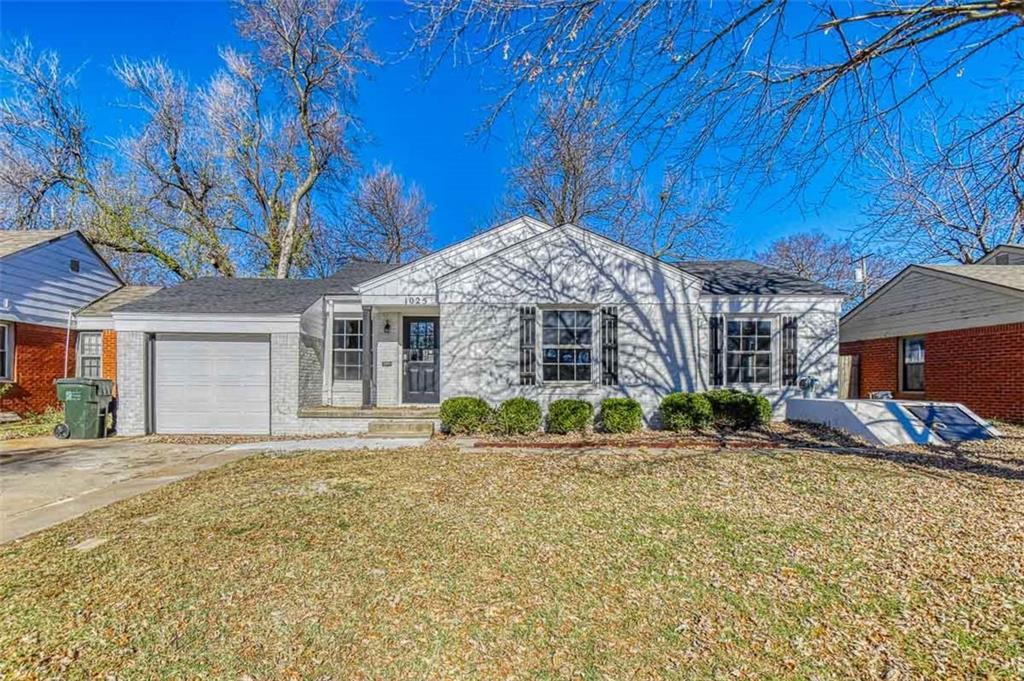 Just a mile east of campus, this home is ready to welcome you. Stunning white brick contrasts nicely with black accent shutters, front door, and porch beam. Porch steps enter to living room with wood floors flowing seamlessly into tiled dining with can lighting, gorgeous light fixture, and almost floor to ceiling windows allowing natural sunlight to bask the beautiful L Shape layout bringing you to the kitchen. The muted grey walls, chrome appliances (fridge, oven, microwave, and dishwasher all match), Grey-White Marble-esque tile flooring, and white cabinetry are all set off to perfection by the mosaic tile backsplash. With ample cabinetry, counter space, and a quality gas range, this kitchen offers design and comfort. Just off the kitchen is a laundry room/butler's pantry. The wood flooring of the living room continues down the hallway throughout all three bedrooms. Each bedroom has ceiling fan. The primary bedroom boasts private bath with oversized tile surround glass enclosed shower, double vanity, and walk in closet. Storage shed out back and storm shelter in front.