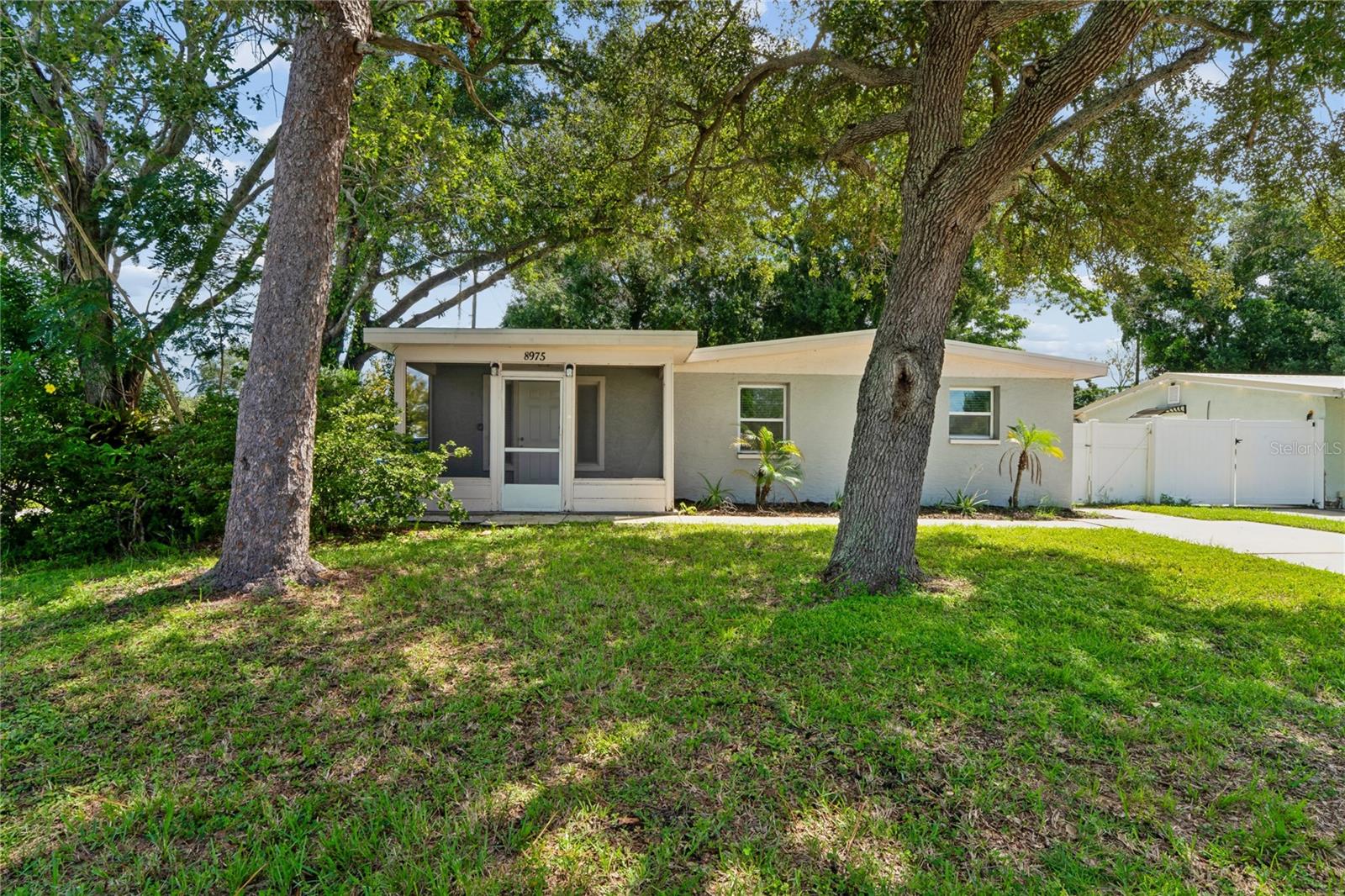 Welcome to 8975 69th St! This 3-bedroom, 2-bathroom property offers over 1,700 square feet of living space, a dedicated laundry area, fenced-in backyard, a screened-in patio, and an HVAC system & water heater that were both replaced within the past five years!! The home is move-in ready with luxury vinyl plank throughout as well as a kitchen that includes white shaker-style cabinets, quartz countertops, and stainless steel appliances. The floor plan provides plenty of room for entertaining with the living room and dining room flowing seamlessly into each other and the kitchen. The primary bedroom offers easy access to the walk-in closet. The additional bedrooms share the second full bathroom. Conveniently located near schools, shopping, and major roadways. Call to schedule a showing today!