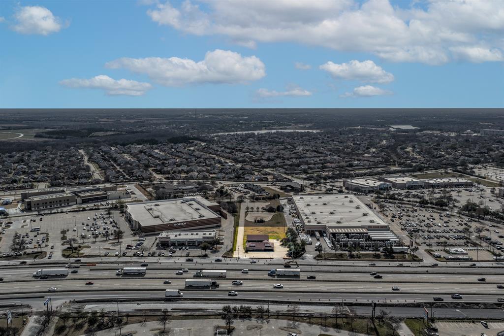 Pleased to present a high-visibility retail or mixed-use redevelopment opportunity located at 801 E Interstate 30 in Rockwall, Texas. Situated on approximately ±1.15 acres along the Interstate 30 frontage road, the property benefits from regional exposure with traffic counts exceeding 102,000 vehicles per day, positioning the site within one of Rockwall’s most active commercial corridors. Surrounded by national retailers including Home Depot, Kohl’s, Walmart, and major regional shopping destinations, the location offers strong consumer draw and established retail synergy. The property is improved with a 5,507-square-foot former veterinary clinic featuring existing utilities, parking, and multiple access points, including an easement connecting the frontage to Ralph Hall Pkwy, allowing for potential adaptive reuse or redevelopment. With I-30 and direct frontage visibility, convenient access, and proximity to dense residential growth and Lake Ray Hubbard, the site is ideally suited for restaurant, QSR, retail, medical, or office users. Rockwall’s continued population growth and expanding regional healthcare network further support demand for medical and professional office uses, while the combination of high traffic exposure, established retail surroundings, and redevelopment flexibility within an IH-30 Overlay District “C” zoning designation allowing multiple buildings up to 60 feet in height presents a compelling opportunity for investors, developers, and owner-users seeking a premier frontage location in a proven trade area.