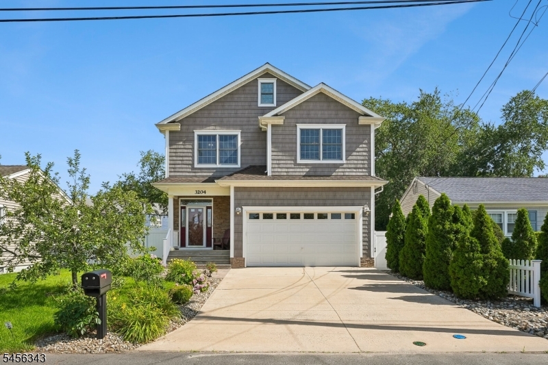 Experience the best of Jersey Shore living in this meticulously maintained 4-bedroom, 2.5-bath home in Point Pleasant. From the moment you step inside, the open-concept design creates an inviting flow. The oversized kitchen offers abundant counter space, a dedicated pantry, and overlooks the dining and living areas, thoughtfully designed for effortless entertaining and everyday living. A powder room completes the first floor.Upstairs, the sun-filled primary suite features a spacious walk-in closet and an en-suite bath with a jetted tub, separate shower, and double vanity. Three additional bedrooms, each with generous closet space, share a full hall bath, while the second-floor laundry room adds everyday convenience. Storage is abundant throughout the property. The third floor offers a versatile bonus space ideal for a home office, recreation room, playroom, or additional storage. Step outside to your private backyard featuring an in-ground pool, perfect for enjoying warm New Jersey summers. The property also features a whole-house water filtration system and irrigation meter. The attached two-car garage provides ample space for parking, storage, or hobbies and is equipped with ceiling fans for year-round comfort. Just a short drive to the beach and minutes from shopping, dining, and everything Point Pleasant has to offer, this property offers thoughtfully designed living spaces in an exceptional Jersey Shore location.
