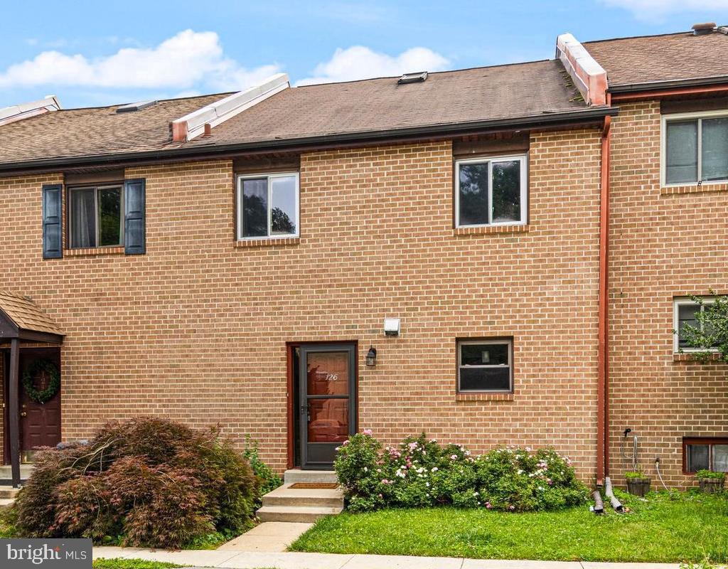 NEW PRICE! Wait until you see how much living space this 3-4 Bedroom, 2.5 Bath townhouse in Radnor Township offers! Nestled in a quiet community with LOW HOA dues in sought-after town of Wayne, this home is within walking distance of parks, playgrounds, shopping, train stations, and top-rated schools.Step inside to a spacious Entry Hall with room for a console table, bench, or cubbies. The updated Kitchen features newer cabinetry, a breakfast bar ledge, and storage shelving. Appliances include a range, microwave, refrigerator, dishwasher, and garbage disposal. The Kitchen flows seamlessly into the generous Dining Room, making everyday living and entertaining a breeze.The Dining Room has a half wall and overlooks a dramatic two-story Great Room with a brick fireplace. Large windows and sliding glass doors open to the rear deck, filling the space with natural light. A convenient Powder Room and large Coat Closet complete the main level.The daylight lower level offers an unexpected bonus: a spacious Family Room that has also served as a bright 4th Bedroom. With a closet and sliding glass doors to the fenced rear yard, this versatile space is ideal for guests, a playroom, home gym, media room, or additional sleeping quarters.Upstairs, the second floor features a spacious Primary Suite with a walk-in closet and private Full Bath. Two additional Bedrooms, a Hall Bath, and a linen closet (with washer/dryer hookups) provide comfortable space for family and guests.The finished third-floor Bonus Room, complete with a closet, offers even more flexibility and is perfect for a home office, studio, hobby room, or additional guest space.Need more storage? You'll love the large unfinished basement, which houses the laundry area, mechanicals, and ample room for storage, exercise equipment, a workshop, or future finishing possibilities.Outside, enjoy the rear fenced yard—perfect for pets, gardening, or relaxing outdoors. Convenient parking is available in the lot in front of the home.Located in the award-winning Radnor Township School District and within walking distance of Wayne Elementary School, this home is also just minutes from parks, shops, restaurants, and community events in downtown Wayne and Devon. Enjoy easy access to the Strafford Farmers Market, regional rail stations, the Blue Route (I-476), Center City Philadelphia, and Philadelphia International Airport.With its flexible floor plan, multiple bonus spaces, and unbeatable location, this home offers exceptional value in one of the Main Line's most desirable communities.