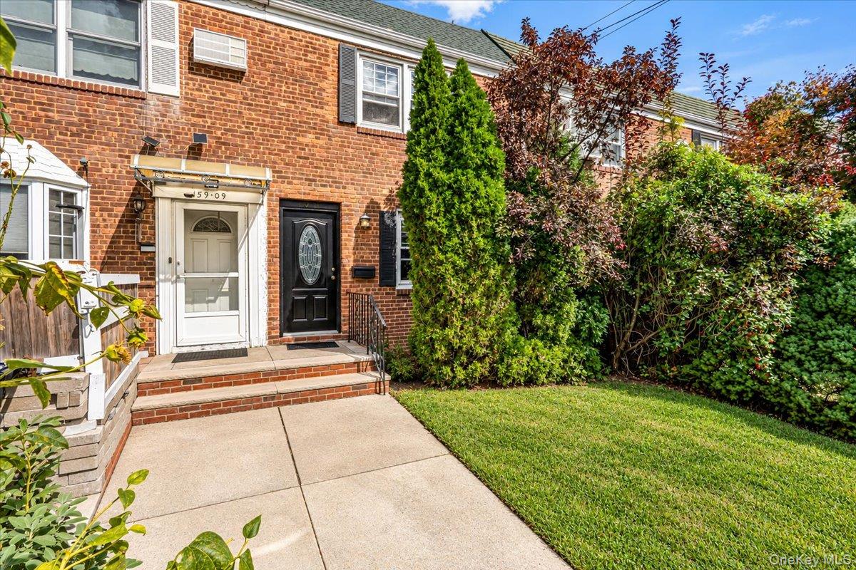 Welcome to this beautifully maintained brick attached home, offering a comfortable 2-bedroom, 1.5-bath layout designed for easy, everyday living! Updated flooring in the inviting living room creates a warm, stylish atmosphere. The spacious eat-in kitchen is a true delight, equipped with rich dark wood cabinetry, gleaming granite countertops, and sleek stainless steel appliances. Upstairs, you'll find two well-proportioned bedrooms, including a spacious primary bedroom thoughtfully converted from the original 3-bedroom layout, plus an updated full bath; a convenient half bath sits on the main level. Downstairs, a finished basement expands your living space with a fantastic family room and dedicated utility area. Out back, a private, paved backyard patio offers a wonderful space to relax or entertain. Best of all, this home features a rare, highly desirable private detached one-car garage in the community driveway, plus major peace-of-mind upgrades, including a new roof (5 years) and a new hot water tank. This is a wonderful opportunity you won't want to miss!