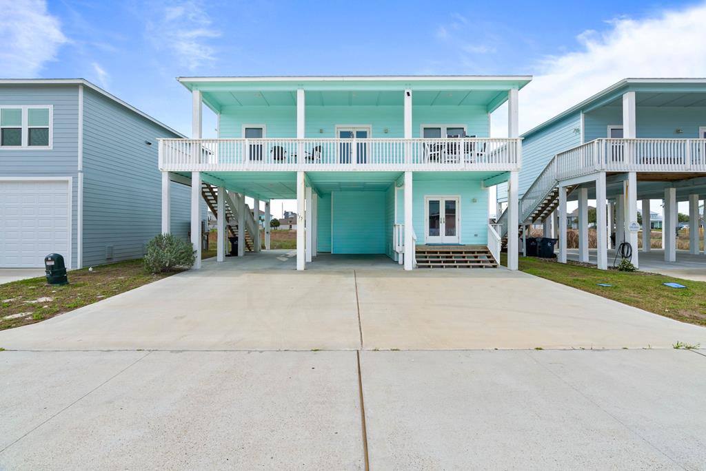 GENEROUS CLOSING COST ASSISTANCE WITH PREFERRED LENDER! Welcome to 175 Paradise Drive in the Ocean Reef Cottages community in Rockport, proudly known as the Redfish Capital of Texas. Designed for relaxed coastal living this beautifully maintained home blends thoughtful upgrades with flexible space. A standout feature is the private downstairs guest suite with full bath, ideal for visitors or multi-generational living. The lower level also includes a separate storage and tackle room perfect for gear, beach equipment, and coastal toys. Inside the main living space you'll find upgraded 6&rdquo; baseboards, impact-resistant windows, upgraded appliance package, and an expanded primary closet designed for comfort and functionality. Located directly across from the community pool, this home offers convenient access to one of Ocean Reef's favorite amenities. With limited upgraded homes currently available in Ocean Reef Cottages, this property presents a rare opportunity to enjoy the Rockport coastal lifestyle minutes from fishing, dining and scenic bays. Don't forget to ask about preferred lender incentive!