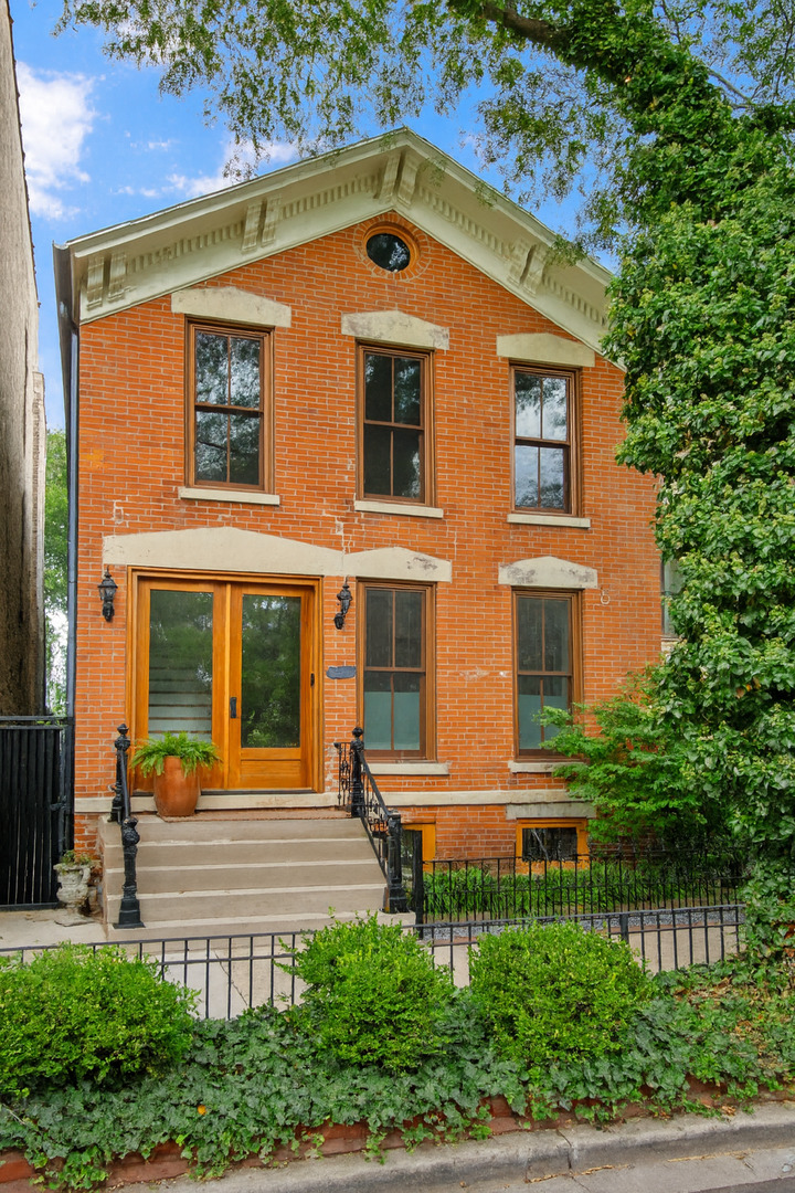 *****    offer has been accepted - oh cancelled 9/7/25***  Gorgeous 1880s brick residence in the heart of the Old Town Triangle seamlessly blends historic character with modern luxury. Sitting on a rare 25' x 144' oversized lot, the home underwent a full gut renovation with a significant three-story rear addition (40' x 20' on all levels), creating an expansive footprint with 5000 sq. ft and four bedrooms and three full baths on the second floor.  The property offers an enviable backyard oasis and a newer two-car garage with access via charming Fern Court. A major design overhaul in 2019 by Sharlene Young of Symbiotic Living Architecture + Design elevated the home with stunning details, including Kitchen: Custom Pinea cabinetry, oversized white marble island, Sub-Zero/Miele/Bosch appliances, beverage fridge, custom banquette, and a dedicated coffee/bar station.   Primary Suite: Spa-worthy bath with a Victoria + Albert soaking tub, Hansgrohe fixtures, custom cabinetry, and dramatic floor-to-ceiling tile.   Ideally located within the sought-after Lincoln Elementary School District, just moments from the lakefront, Wells Street dining and entertainment, and iconic neighborhood favorites like Twin Anchors and Marge's Still, this home is move-in ready for its next chapter!