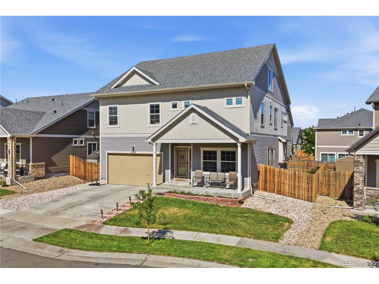 Offering over 5,100 square feet of beautifully maintained living space, this spacious Turnberry home is designed to adapt to every stage of life. With three finished levels above grade and an unfinished basement ready for your vision, there's room to spread out today and grow into tomorrow. The flexible layout includes five generously sized bedrooms and two lofts. Whether you're hosting holidays, accommodating multiple generations, or simply craving extra space, this home delivers. The open-concept main level is warm and inviting, anchored by a well-appointed kitchen featuring granite countertops, stainless steel appliances, abundant cabinetry, a center island, and a walk-in pantry. Recent updates include a dishwasher (2022), hot water heater (2023), AC condenser coil (2025), kitchen sink (2025), and refrigerator and stove/oven (2026), offering modern convenience and peace of mind. Step outside to a charming covered front porch or unwind in the beautifully landscaped backyard, where lush green grass, colorful flower gardens, and a spacious patio create the perfect setting for summer barbecues, morning coffee, or evenings under the stars. The included trampoline is ready for backyard fun from day one. Just a short walk to neighborhood parks and an elementary school, with Prairie View Middle and High School only minutes away, this home also offers quick access to I-76 and is just a seven-minute drive from Brighton's shopping, dining, and everyday conveniences. Packed with space, flexibility, and endless possibilities, this is a home you'll love coming home to.