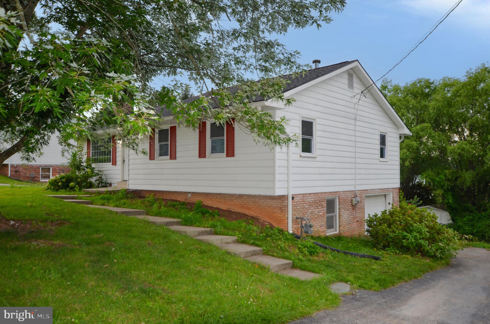 This ranch-style home features single-level living and is ready for immediate purchase.  The property offers comfortable spaces and practical design elements , creating a welcoming atmosphere.   This home features a new roof, ensuring peace of mind for years to come.  Other recent updates include new flooring and fresh paint.  The property includes a basement for additional storage and a rear deck with steps to the back yard.  Natural gas heat provides efficient heat throughout the home.Located near Codorus State Park, residents can enjoy easy access to recreational opportunities. A perfect place to call home.