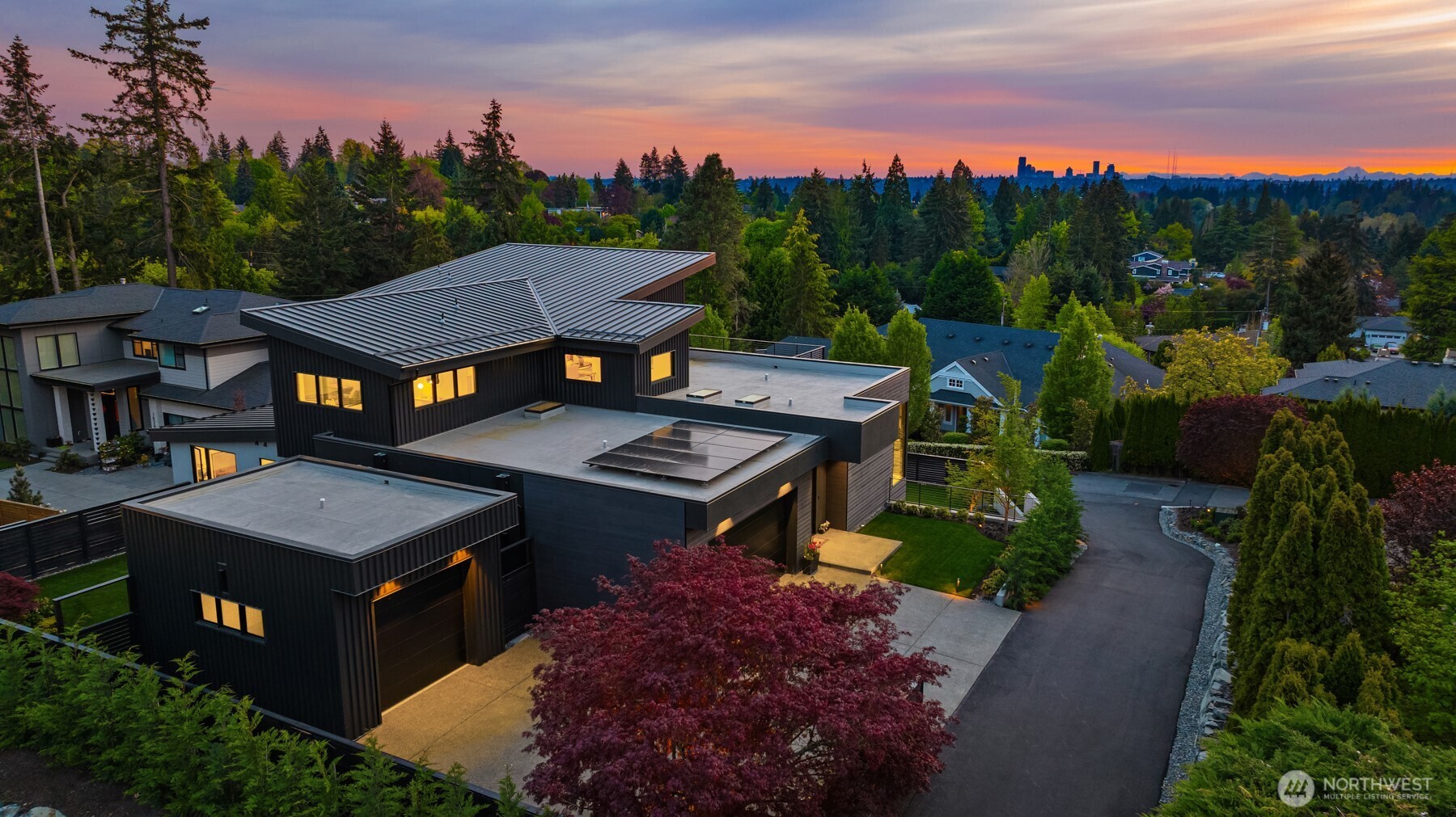 Attention to detail and craftsmanship are personified in this stunning new home built by respected local builder JBeloff Homes. Located down a private lane, this home is perched high to ensure privacy while giving you west facing, panoramic, horizon views making you feel like you are eye level with the Cascade Mountains allowing you to squeeze out every last moment of every sunset. Natural light pours through near floor to ceiling windows creating an airy vibe that clears the mind and refreshes the soul. Sophisticated design elements hand chosen to inspire yet still feel warm and welcoming to all who enter. Generous outdoor spaces on every level with a secure private yard. Minutes to Medina Elem, parks, beaches, downtown Bellevue amenities.