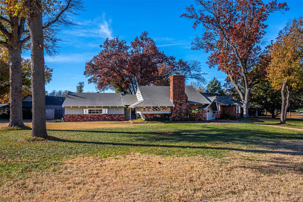 Charming Luke Rogers mid-century ranch home that looks straight from a fairytale book.  Located on a cul-de-sac, huge corner lot with mature landscaping and gorgeous shade trees.  The oversized chimney, original oversized front door and small diamond lattice windows add to the storybook design.  There's opportunity to personize and make this one level home your own inside but many updates have been done such as Pella windows.  Kitchen has updated granite, tile and cabinets, Bosch dishwasher and gas range.  Primary bath has updated granite, cabinets, tile and glass shower, along with dual closets.  Half bath added.  Double car garage is oversized and deep.  Wileman Belle Isle Addition is one of OKC's most sought-after neighborhoods in a prime location close to shopping, dining and quick I-44 access.