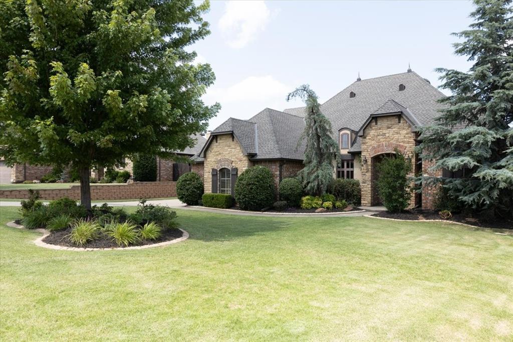 Absolutely STUNNING home on a large treed lot in the desirable Golden Gate at Twin Bridges addition!  This home has a study with a beautiful beamed ceiling, bonus room, formal dining and open concept kitchen/living/dining and 4 beds! As you enter the home you will love the soaring ceilings and all the windows and natural light.  Living area boasts wood floors, stacked stone fireplace, built-ins and an open view to the sprawling kitchen! This chef's kitchen includes two bar areas, island w/rinse sink, granite counters, built-in stainless appliances, 5 burner gas cooktop, cabinets galore, and a walk in pantry! Master suite is a spacious spa retreat w/soaker tub, walk-around shower and a huge master closet!  The 2nd bedroom is a MIL w/walk-in closet with it's own full bath! 2 upstairs bedrooms with Jack and Jill bath and walk-in closets. Versatile bonus room and half bath.  And a 1/2 bath downstairs as well. Laundry w/mud sink, garage storm shelter, and gorgeous outdoor space with fireplace and much more to enjoy!  New roof installed May 2025, new carpet and full house freshly painted inside (walls & ceilings). Neighborhood has a community pool with a recreation center, beautiful lake and a neighborhood playground. Heritage Elementary is in the neighborhood situated on the north side of the addition. Close to schools, shopping and highways.