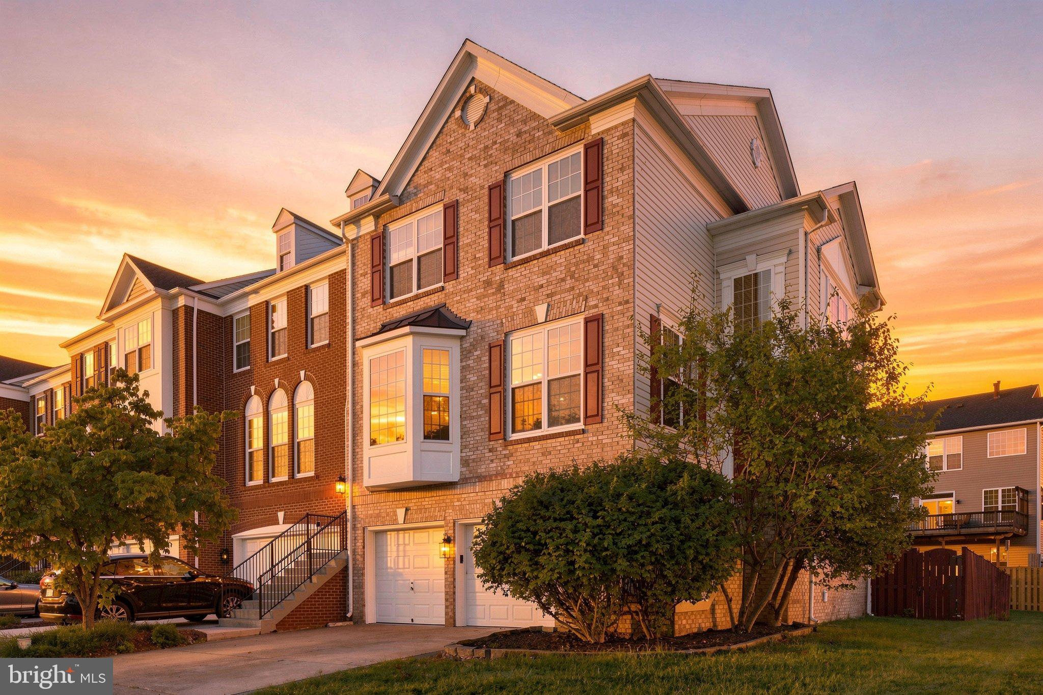 Welcome to this incredibly spacious and light-filled end-unit townhouse offering a two-car garage, a versatile layout, and an unbeatable commuter-friendly location. The upper level features three bedrooms, while the main level provides multiple living and entertaining spaces, including a family room, two dining or sitting areas, and a private office. The finished lower level offers additional living space along with a bedroom and full bathroom, plus direct access to the fully fenced private backyard and separate garden area. Abundant windows throughout the home bring in plenty of natural light and complement the surrounding greenery. Tucked away in a quiet section of the community, the home is just steps from the tot lot, community pool, tennis and basketball courts, with plenty of guest parking nearby. Ideally located near the Ashburn Silver Line Metro, Dulles Toll Road, Inova Emergency Room, shopping, dining, and everyday conveniences. Recent improvements include a roof replaced in 2019, flooring completed between 2024–2026, furnace/HVAC replaced in 2024, and washer and dryer replaced in 2023.