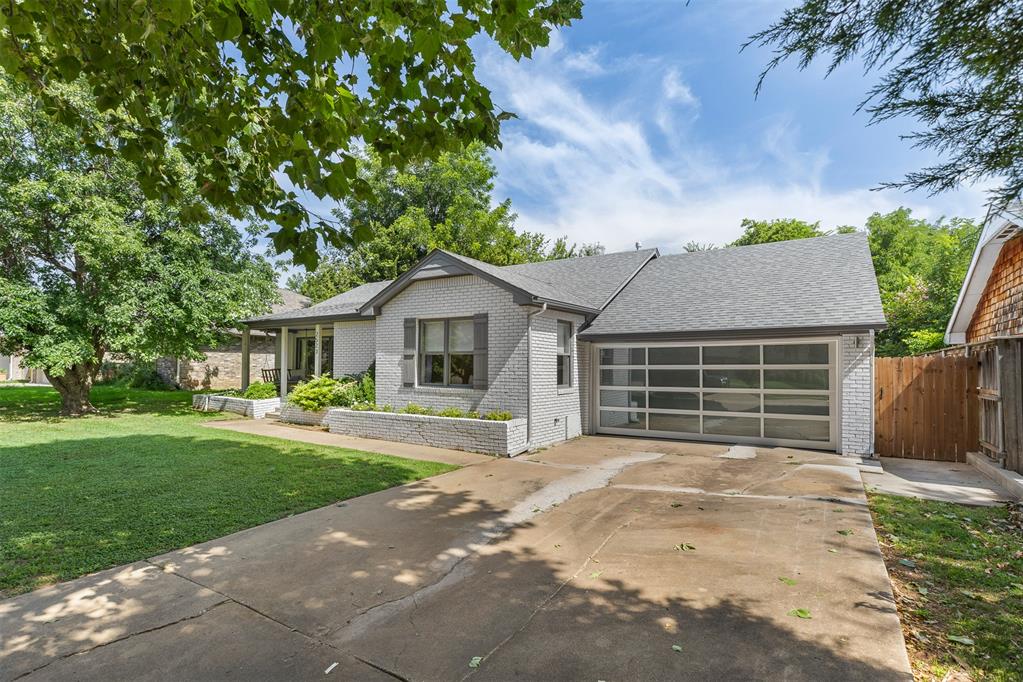Located in the sought-after Belle Isle neighborhood this 3 bedroom 3 bathroom home is move-in ready! The house was extensively remodeled in 2017 including a brand new kitchen, bathrooms, finishes, and open-concept. Beautiful hardwood floors run through all the living areas and bedrooms, and the 2-car, air conditioned garage doubles as a huge 2nd living space with epoxied floors, tall ceilings, and a full bathroom with 2nd laundry. The garage can be closed off from the house with separate exterior access which presents an opportunity for rental income as a studio, multi-generational living, home office, and more! Outside enjoy a large, private backyard with a concrete patio, or a covered front porch with porch swing. The location is hard to beat efficiently getting you anywhere in the metro, close to multiple grocery stores, target, and OKC's newest development: The Oak OKC where you will find restaurants, shopping, and more! There is a partial basement with reinforced concrete which makes for a great storm shelter or extra storage.