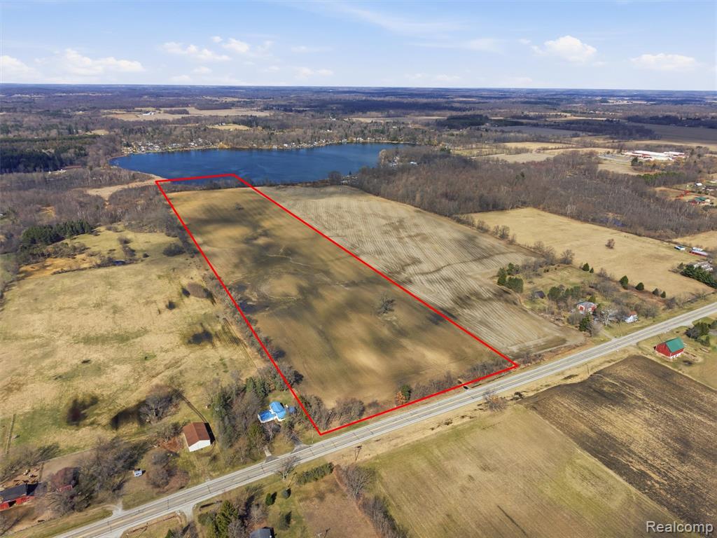 Incredible opportunity to own 57.24 pristine acres stretching to Lake Pleasant (36.3 acres of land and 20.94 acres of Lake Pleasant with full riparian rights), featuring approximately 1,250 feet of lake frontage. This rare property offers the perfect blend of privacy, natural beauty, and recreational potential. Ideal for outdoor enthusiasts, the land is a prime habitat for duck, geese, and deer hunting. Located within the highly sought-after Lapeer School District, this property presents endless possibilities—whether you’re looking to build your dream home, create a private retreat, or develop a one-of-a-kind estate.Electrical and natural gas are available at the road for added convenience. A survey is already on file and attached. Buyer to be responsible for perc test.Don’t miss your chance to own this exceptional piece of land with expansive lake frontage and unmatched potential!