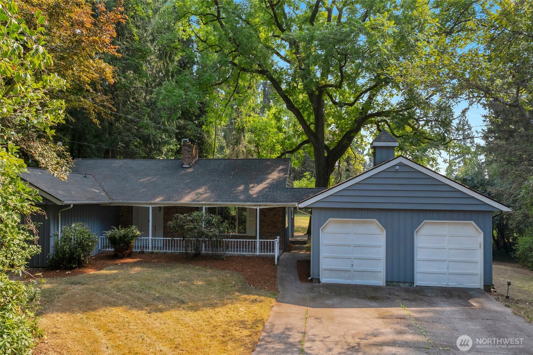 Developer Alert! Investment opportunity in Lake Forest Park.  This sprawling rambler is sited on a private and tucked away 1.47 Acres (Gated & fully fenced). Previous developer in 2018 was designing for a 4 to 5 lot plat. Sewer connections are at the west property line. Recent zoning changes may allow for higher yield (up to 12 units). Surveys and plat designs available. This site has a majestic feel relating to the huge Black Walnut Tree, likely one of the largest in Puget Sound. The versatile rambler floorplan can be up to 5 bedrooms to include the extra room in the garage. 4th Bedroom is 13.5’ x 23.5’ and doubles as a Family Room / Office. Don’t miss finished attic room. Detached 2 car & ample parking. Great place to live, or develop.