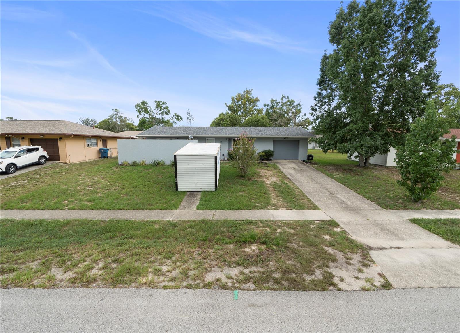Welcome to a charming single-family home nestled in the heart of Spring Hill, FL. This property offers a rare opportunity to own a home in a peaceful, established neighborhood while still being close to everyday conveniences. With a spacious lot and functional layout, it really is the perfect investment opportunity. Step outside to enjoy the large backyard, which offers endless possibilities for outdoor activities, gardening, or future expansions. The property's size provides privacy while maintaining a welcoming, neighborhood-friendly feel. It's a great canvas for personalization and long-term enjoyment.

Located just minutes from local shopping, dining, and schools, this home combines convenience with tranquility. Commuting is easy with major roads nearby, and residents enjoy access to all the amenities that make Spring Hill a desirable place to live. 

Come See Today!