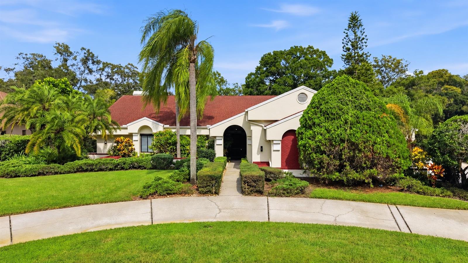 Beautifully remodeled 4-bedroom, 4-bathroom home with a spacious 3-car garage, located in a desirable gated golf course community! This stunning property features a private, separate in-law suite with its own bedroom and full bathroom, perfect for extended family or guests. The home has been extensively renovated with fresh interior and exterior paint, brand-new luxury vinyl plank (LVP) flooring throughout, modern light fixtures, and new window blinds. The completely renovated kitchen features new cabinetry, elegant quartz countertops, and brand-new appliances. All bathrooms have been beautifully remodeled with new tile, vanities, and modern fixtures. Step outside to enjoy the private pool area featuring a newly redesigned and freshly redecorated designed concrete pool deck, ideal for relaxing or entertaining. The exterior has been refreshed with updated landscaping with golf course view. Additional features include hurricane shutters and a gas-powered backup generator for added peace of mind. Residents enjoy access to the community's golf course and clubhouse. With extensive upgrades, a versatile private in-law suite, and exceptional community amenities, this move-in-ready home is a must-see!