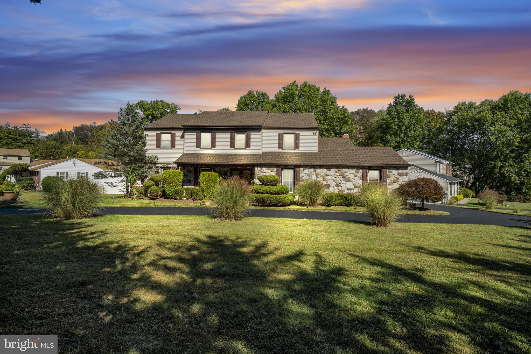 Every now and then, a home comes along that simply feels right from the moment you arrive. Nestled in Upper Moreland Schools, this beautifully appointed 5 bedroom, 2.5 bath residence sits on a beautifully landscaped corner lot and offers the perfect balance of elegance, warmth, and privacy.A circular governor’s driveway welcomes you with two entrances, leading to a property surrounded by mature trees that provide both shade and seclusion. The covered front porch is a peaceful retreat where the current owners enjoy their morning coffee or unwind after a long day.Inside, a large and inviting foyer sets the tone for what lies beyond. The main level features new flooring, fresh paint, and carefully chosen lighting that complements each space. The updated kitchen includes granite countertops, stainless steel appliances, and an eat-in area that opens to the family room. The sunken family room features marble flooring, a gorgeous fireplace, and direct access to the multi-level deck, creating an easy flow for gatherings and everyday living.The first floor also offers a flexible bedroom currently used as an office, a formal dining room with crown molding and chair rail, and a sitting room perfect for conversation or quiet moments.Upstairs, the primary suite feels like a private sanctuary with a spacious walk-in closet, dressing area, and a beautifully updated bathroom featuring marble tile, soaking tub, walk-in shower, and a bidet. Three additional bedrooms share a well-appointed full bath.The lower level offers endless possibilities with a finished recreation area ideal for a theater or game room, a bonus room suitable for a guest space, and plenty of storage.Step outside to experience a backyard designed for living and entertaining. The extra-large, professionally designed multi-level deck includes a trellis and generous areas for dining or lounging. Underneath the deck is ample storage, while the expansive side yard provides enough space to host any size event and has even served as a wedding venue.Every detail of this home has been thoughtfully curated for those who appreciate refined living and timeless design. With easy access to nearby shopping, dining, and commuter routes, 4280 Frontier Road offers both luxury and convenience in one of Huntingdon Valley's  most desirable areas.Experience the comfort, craftsmanship, and character this home offers. Schedule your private tour today and see why this property is truly one of a kind.