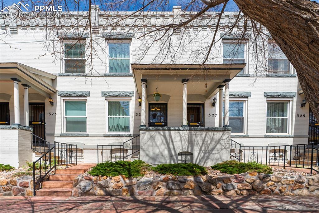 Vintage elegance meets urban contemporary–remodeled condo in the historic Governors' Park quarter of Capitol Hill, one of Denver’s most vibrant communities! This 2-bed 2-bath condo blends modern restoration with an industrial appeal reminiscent of the historic context of this pristine home. In an area renovated w/modern high rises, this turn-of-the-century gem is preserved in the most prime location walkable to restaurants and bars, shops, nightlife, and convenient amenities. Residential parking permits are available street-side, and bike and foot paths are along every block, perfect for city dwellers and outdoor lovers alike. The open floor plan features energy efficiency, large new windows, new flooring throughout, all new paint, custom built-ins, new kitchen and bathrooms, all new finishes and surprise special touches - complimented by original brick, stained glass, and salvaged fireplace iron surround and white oak mantle, a decorative entryway feature. The kitchen is impressive in size and storage, new appliances, high-end quartz, under-cabinet lighting, and exposed brick pantry. More upgrades throughout include smart dimmable lights, switches, thermostat, in-home laundry, custom passage door lites, and atmospheric basement family room with cozy proportions and exposed timber, perfect for a coffee shop vibe, movie nights, yoga studio, play space and slumber parties, or surreptitious speakeasy! There are so many high-quality custom features that you need to experience-no detail was overlooked! For the outdoor enthusiast, Governors' Park (already a beautiful park) is part of Reimagine Cap Hill Parks, with a vision plan for more gathering spaces, community events, play for all ages, work spaces in the park, and gardens and other opportunities to connect with nature in the city. Whether you're looking for your next well-appointed home, or a smart investment, this condo offers the best of Denver living — location, lifestyle, swank, and sophistication!