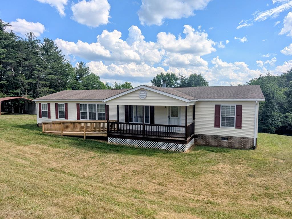 Well-maintained 3 bedroom, 2 bath home offering a functional floor plan and convenient location just a short drive to Floyd and Hillsville. A one owner home and lived in very gently this home offers over 1,800 sq ft of living space. Inside you'll find laminate flooring throughout much of the home, a spacious open kitchen with plenty of cabinet and counter space, a comfortable living room, and an additional bonus room that offers flexibility for a home office, playroom, or den. The primary suite features a large private bath with a garden tub, separate shower, and ample storage. Gas log fireplace provides added comfort, and the home is served by a heat pump for heating and cooling. Kitchen appliances including the range, refrigerator, dishwasher, plus the washer and dryer will convey. Outside offers a nice yard with room to enjoy gardening, pets, or outdoor activities.