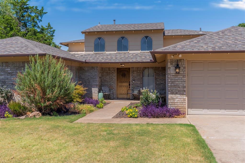 Ideally situated in a sought-after, established neighborhood in the heart of Edmond, this beautifully updated home seamlessly combines modern features with an exceptionally versatile floor plan. Durable wood-look tile flooring flows throughout the main level, where a cozy gas-start fireplace anchors the primary living room with direct patio access right off the kitchen—creating a seamless setup for daily life and outdoor entertaining. The kitchen itself impresses with updated cabinetry, under-cabinet lighting, and ample counter space, while a unique, multi-level secondary living room offers endless possibilities for a home office, library, music room, or play area. The smart floor plan places the private primary suite conveniently on the main floor, leaving all additional bedrooms upstairs for ideal separation. Practical peace of mind comes easy with major updates already complete, including a 2023 roof, a 1.5-year-old hot water heater, a 5-year-old dishwasher, a full front and back automatic sprinkler system, and an attached 2-car garage. Combining prime location, major big-ticket updates, and flexible living spaces, this Edmond gem is ready for its next owner—reach out today to schedule your private tour!