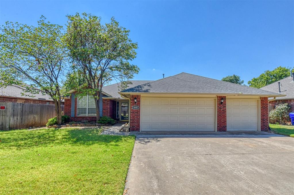 Move in ready with 3 car garage! Open and split floor plan with new tile floors, fresh paint, high ceilings and great natural light! Nice laundry room with built-ins, huge primary closet, under cabinet kitchen lighting, gas fireplace with nice hearth, storm door (front) and super clean. Large covered back patio, sprinkler system (front & back), new gutters connect to new front french drain (drains east), insulated and automatic garage doors on quiet street with superior schools.