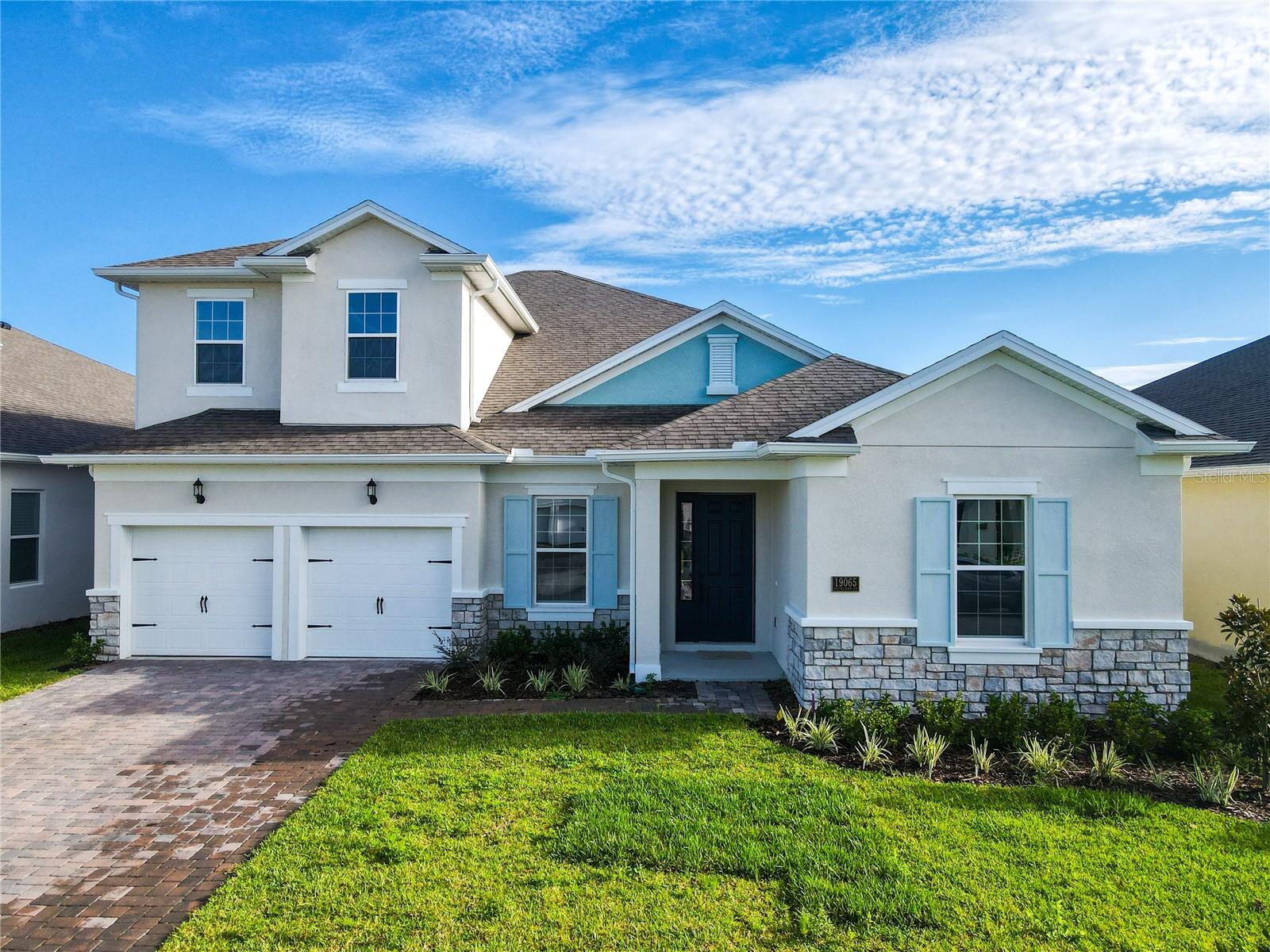 Seller is offer a 1 year Home Warranty with offer!!!

Welcome to 19065 Blueleaf St, a stunning new construction home in the vibrant city of Lake Nona. This move-in ready property offers 6
bedrooms and 4 bathrooms, spread across an impressive 4,415 square feet of living space. It's a perfect blend of modern design and practical
living, ideal for families or those who love to entertain. As you step inside, you'll be greeted by high ceilings and an open floor plan that creates a sense of spaciousness. The main living areas feature beautiful porcelain tile flooring, adding a touch of elegance and easy maintenance. The kitchen is a chef's dream, boasting quartz countertops, enlarged island with seating for 6, stainless steel appliances, and a stylish backsplash. It's the perfect spot for preparing meals or gathering with friends and family. The first floor houses one of three primary bedrooms, a convenient feature for those who prefer single-level living. This suite includes a luxurious bathroom with dual vanities, a separate tub, and a rain-fall shower. It's your personal oasis within the home. Heading upstairs, you'll find plush carpeting underfoot and a versatile loft space that can be used as a play area, home office, or entertainment zone. The second floor is home to the other two primary bedrooms, providing ample space for everyone in the family or for hosting guests. One of the standout features of this home is the seamless indoor-outdoor living experience. Glass panels open to the back porch, allowing you to enjoy Florida's beautiful weather and extend your living space outdoors. Located in the innovative and trendy Lake Nona area, this home offers the best of both worlds - a peaceful residential setting with easy access to urban amenities. You'll be conveniently close to shopping centers, restaurants, theme parks, and major roads. The Orlando International Airport is also nearby, perfect for frequent travelers or welcoming out-of-town guests. Families with children will appreciate the top-rated schools in the area, ensuring quality education is just around the corner. This house truly has it all - modern features, spacious rooms, quality finishes, top of the line appliance and a prime location. It's more than just a house; it's a home designed for comfortable living and making lasting memories. Whether you're looking for your forever home or a smart investment property, 19065 Blueleaf St offers an exceptional opportunity. This new listing won't stay on the market long, so don't miss your chance to make it yours. Experience the perfect blend of comfort, style, and location in this brand-new Orlando home. Schedule a viewing today and take the first step towards calling this beautiful property your home. Your dream of owning a modern, move-in ready home in one of Orlando's most desirable neighborhoods could soon become a reality!