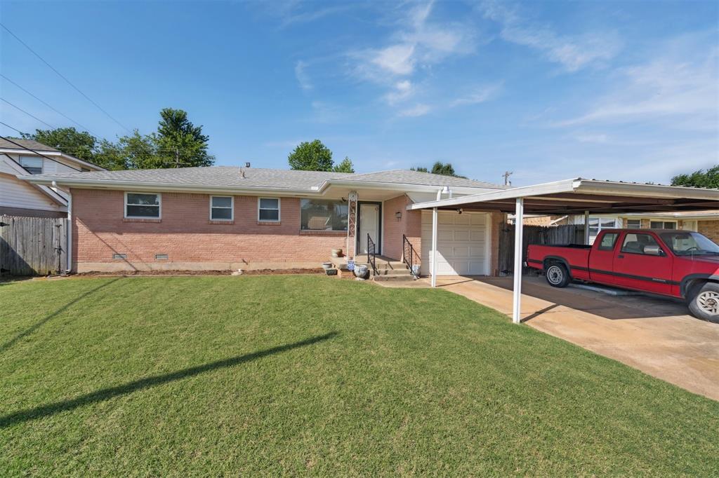 GREAT LOCATION! This Well Maintained Home features 2 Bedrooms, Remodeled Kitchen with Solid Surface Countertops, Breakfast Bar, Builtin Electric Range and Oven and lots of Storage. Main Bathroom is equipped with Tub and Shower and also a Walkin Shower. Home sits on Large Lot with a Walkin Storm Shelter in Garage. Plus a 2 Car Carport!  MUST SEE! Property is being SOLD in AS IS CONDITION!