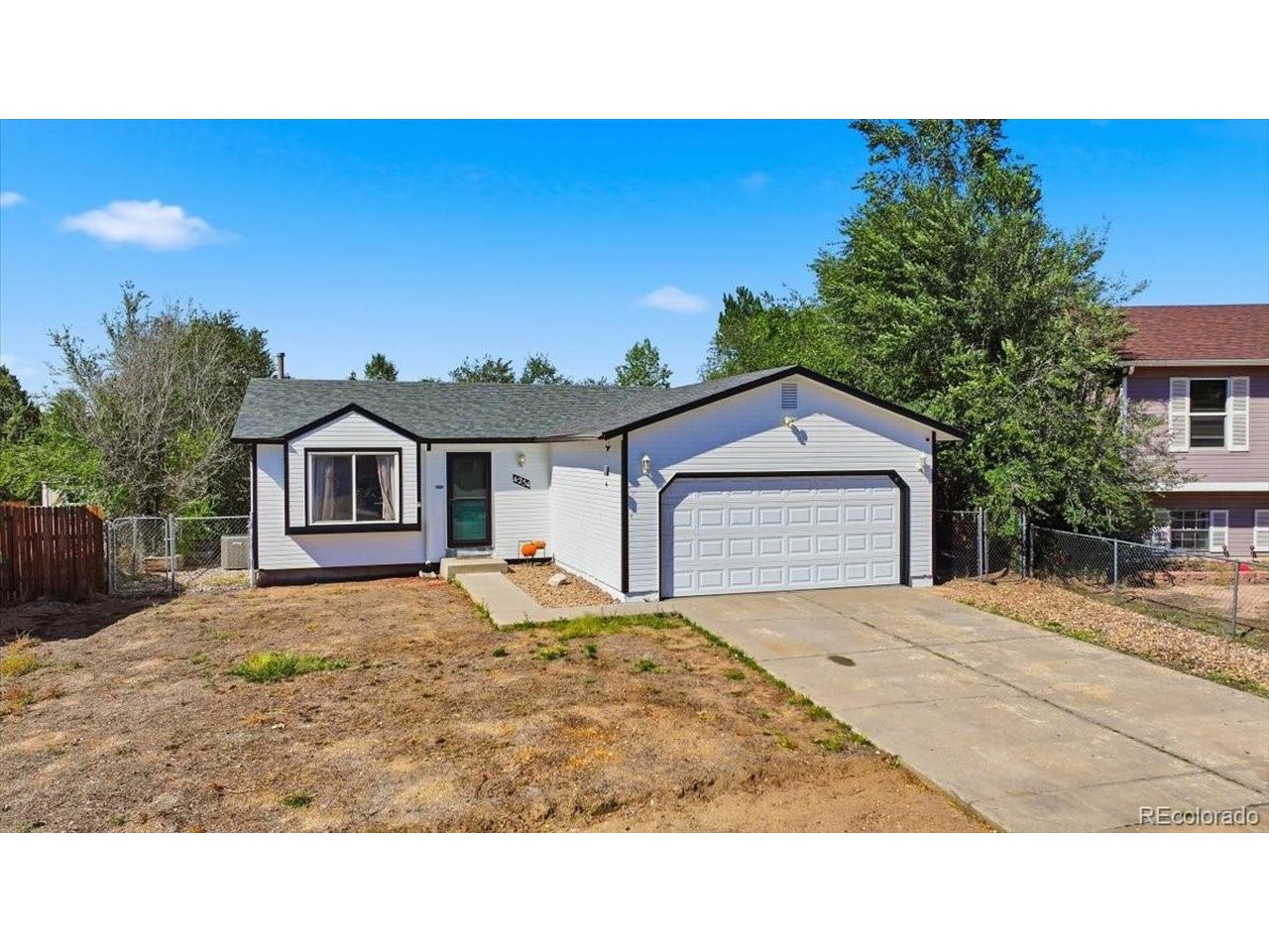 Welcome home to this wonderful ranch-style home offering comfortable living, a versatile layout, and a convenient Colorado Springs location! Whether you're a first-time homebuyer, looking for extra space, or searching for a home close to local military installations, this property is full of possibilities. The main level welcomes you with beautiful cherry hardwood floors in the living room, where a large bay window fills the space with natural light and creates a warm, inviting atmosphere. The open kitchen offers plenty of room for a full-sized dining table, making it easy to gather for everyday meals or entertain family and friends. Granite countertops, stainless steel appliances, and a built-in pantry make this kitchen both functional and appealing. Two comfortable carpeted bedrooms and a newly remodeled full bathroom complete the main level. Downstairs, the spacious basement provides even more room to spread out, featuring two oversized bedrooms and a second full bathroom. The first bedroom offers direct access to the bathroom, and a pass-through closet with under-stair storage. The current primary bedroom is located in the basement and is non-conforming, offering flexible options for ideal sleeping space, media / family room or hobbies. You'll also appreciate the dedicated laundry and utility room, along with additional storage space to help keep everything organized. The attached two-car garage provides access to the fully fenced rear yard and storage shed. Enjoy being just minutes from shopping, dining, entertainment, and everyday essentials. Peterson Space Force Base is approximately 10 minutes away, with Fort Carson about 20 minutes away. The home also offers convenient access to Schriever Space Force Base and downtown Colorado Springs, making commuting and enjoying everything the area has to offer a breeze. Come discover the comfort, space, and convenience this charming ranch home has to offer!