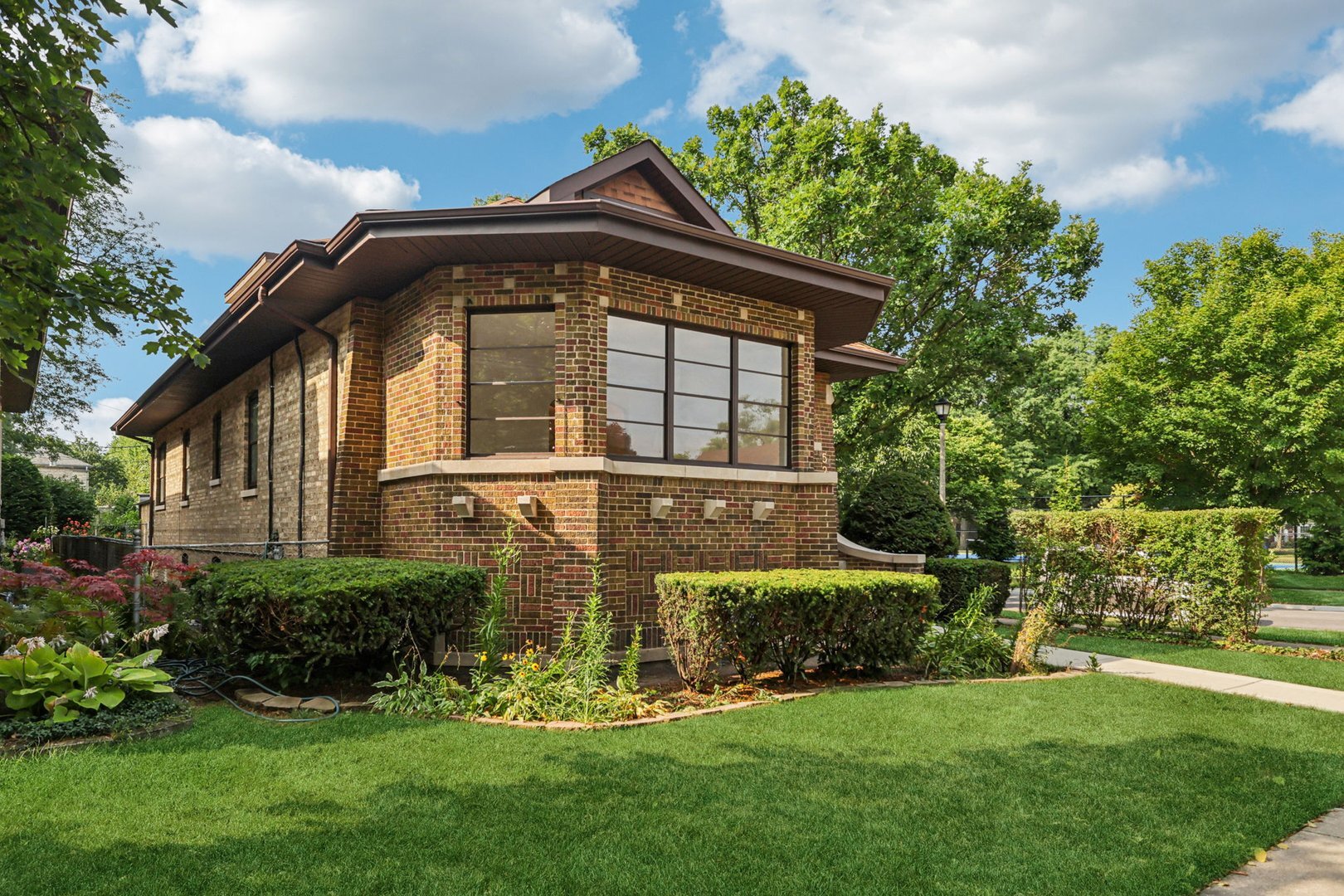 Move right in to this spacious, updated bungalow! This beautifully updated jumbo bungalow blends classic charm with modern comfort. Step inside to find fresh, neutral tones and gleaming hardwood floors throughout the sun-drenched main level. The spacious living room and formal dining room provide the perfect setting for entertaining or relaxed family gatherings. With five generously sized bedrooms-three on the main level and two upstairs-there's plenty of space for everyone. The large, functional kitchen offers ample cabinet and counter space and is ideal for everyday meals. The home features three full bathrooms and a full basement-perfect for a media room, rec room, home gym, or creative studio. Enjoy the outdoors in your fenced backyard with a deck, and take advantage of the two-car garage off the alley. Located directly across from scenic Lorel Park and just a short stroll to the shops, cafes, and restaurants of vibrant downtown Skokie, this home offers the best of neighborhood living with modern updates and room to grow. Sq Ft includes basement
