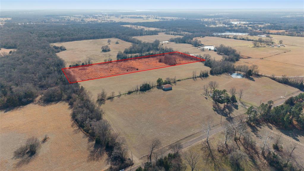 This level, 7.95-acre grassy parcel is tucked away via a 30-foot easement off CR 2426, offering a blank canvas with minimal tree cover. While currently unfenced and without utilities, the land is ideal for horses or cattle once secured. For those looking to build or settle, water access would come from the road and possible electricity is located a short distance away on the neighboring property to the west. Alternatively, the secluded nature of the lot makes it a prime candidate for a private off-grid retreat or a remote weekend campsite.